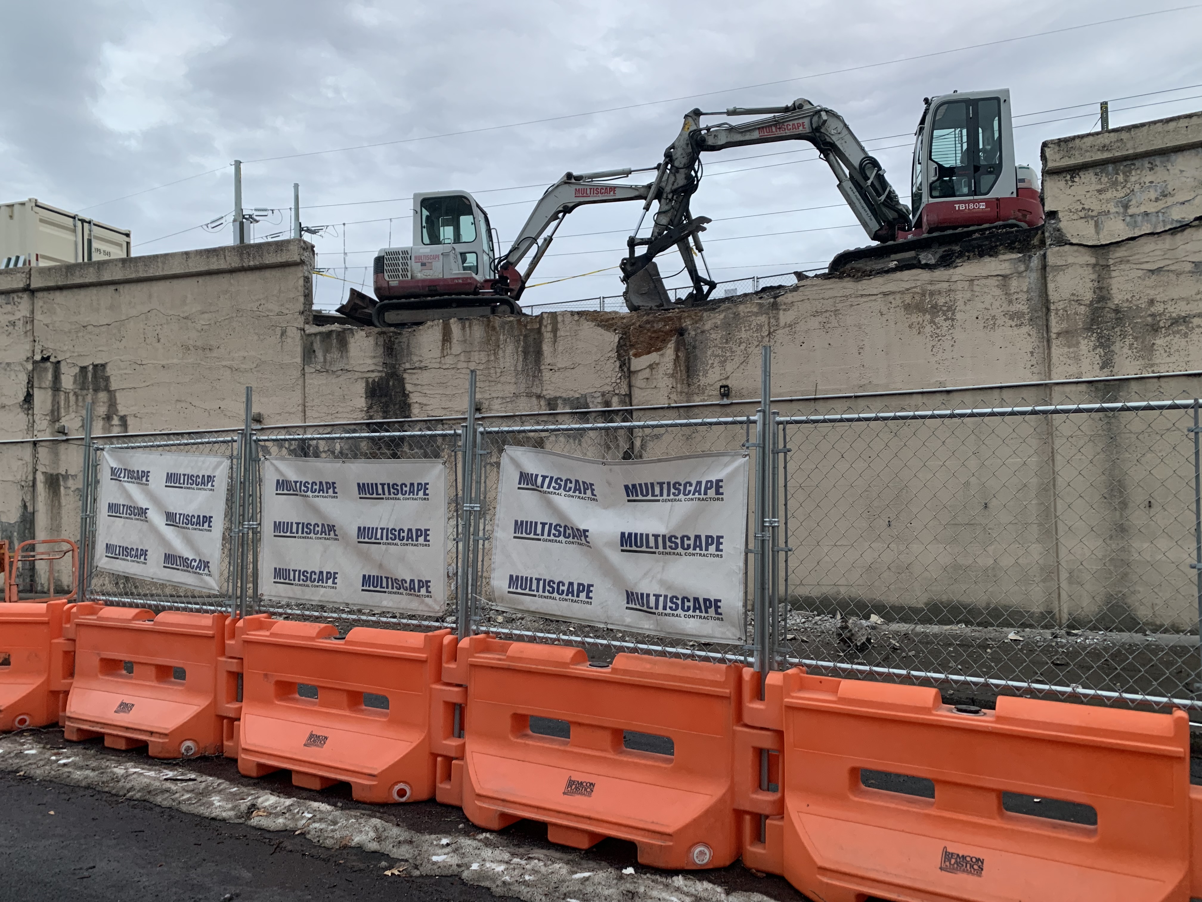 Work on a large retaining wall along Lackawanna Avenue in...