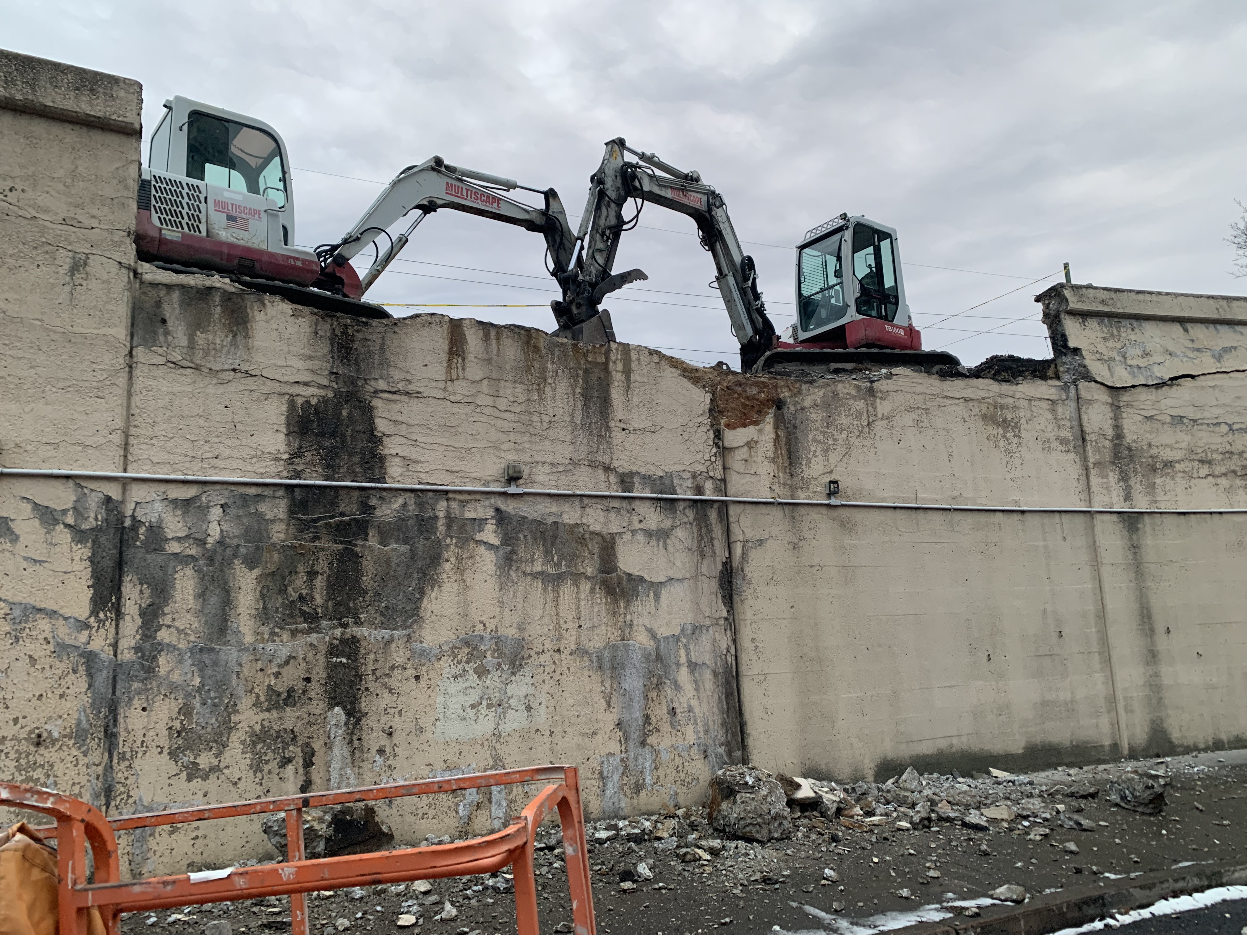 Work on a large retaining wall along Lackawanna Avenue in...