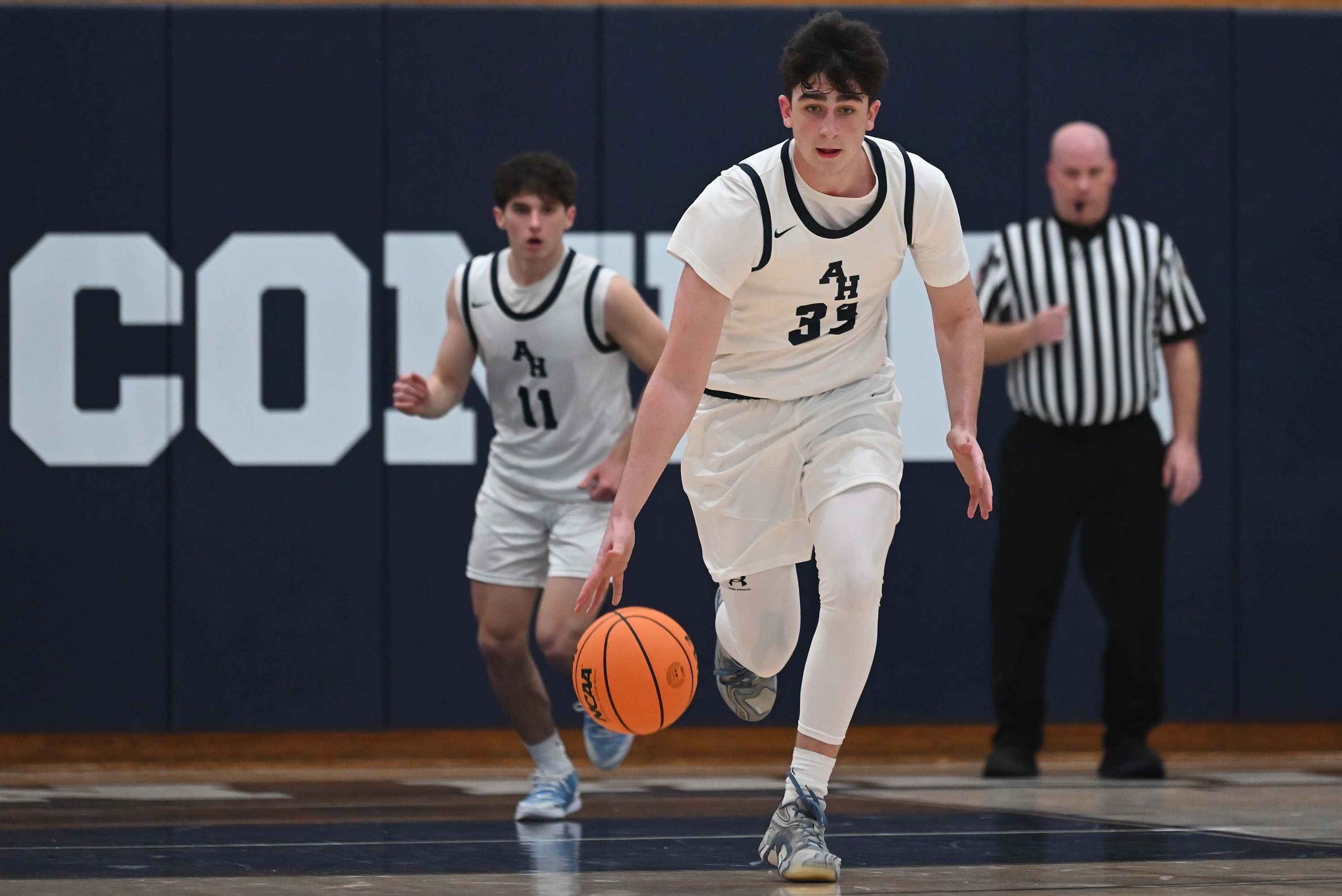 Abington Heights’ Jordan Shaffer moves the ball during the basketball...