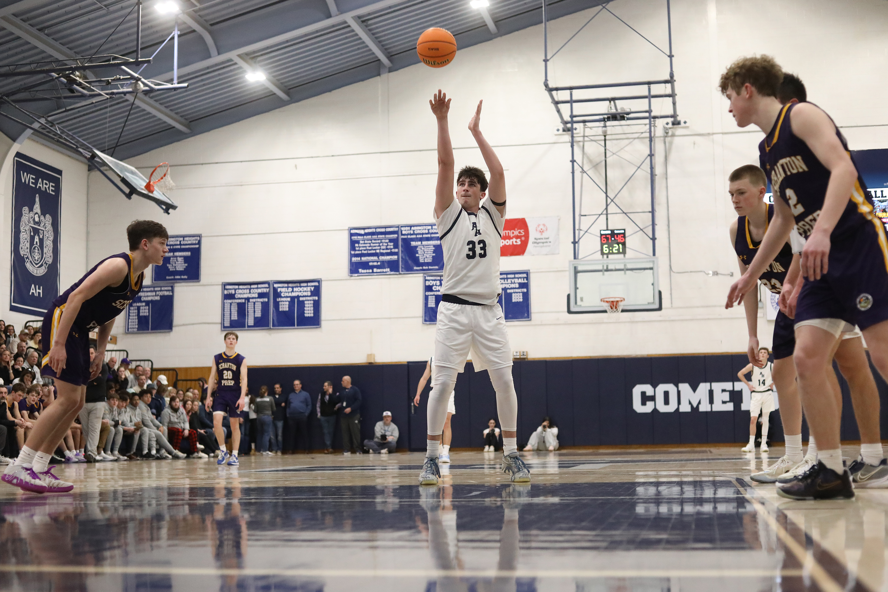Abington Heights’ Jordan Shaffer takes a shot during the basketball...