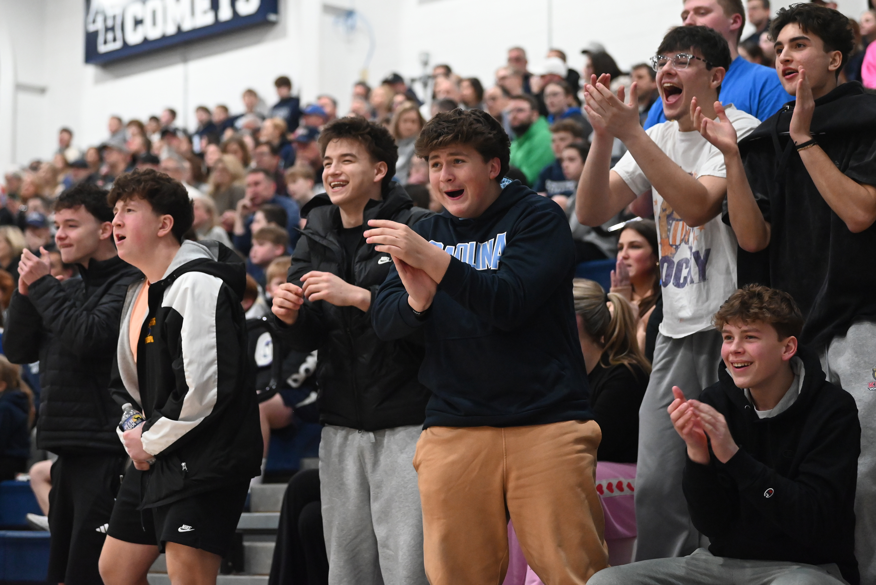 Valley View fans cheer on their team during the basketball...