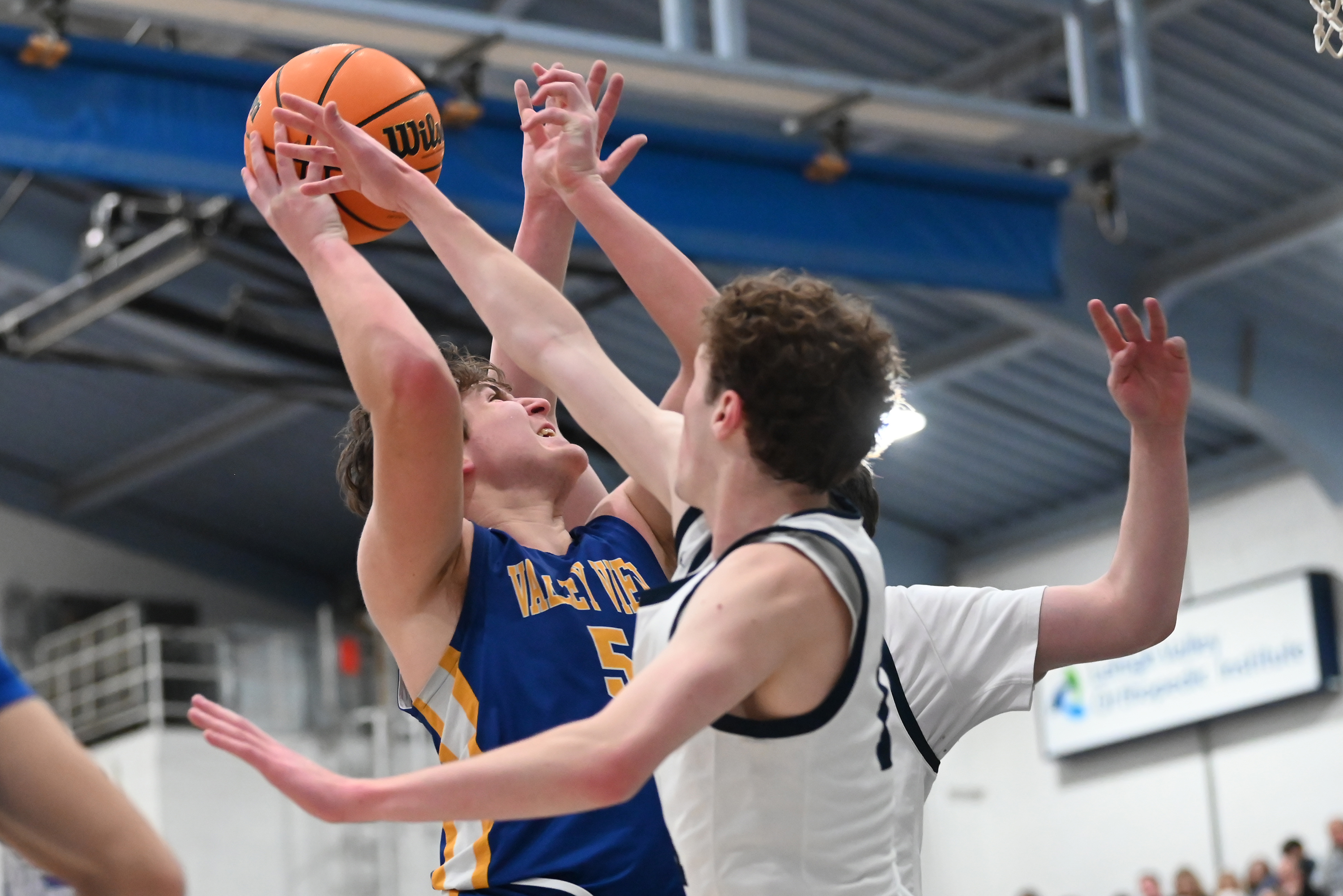 Abington Heights players defend Valley View’s Brady Cunningham during the...