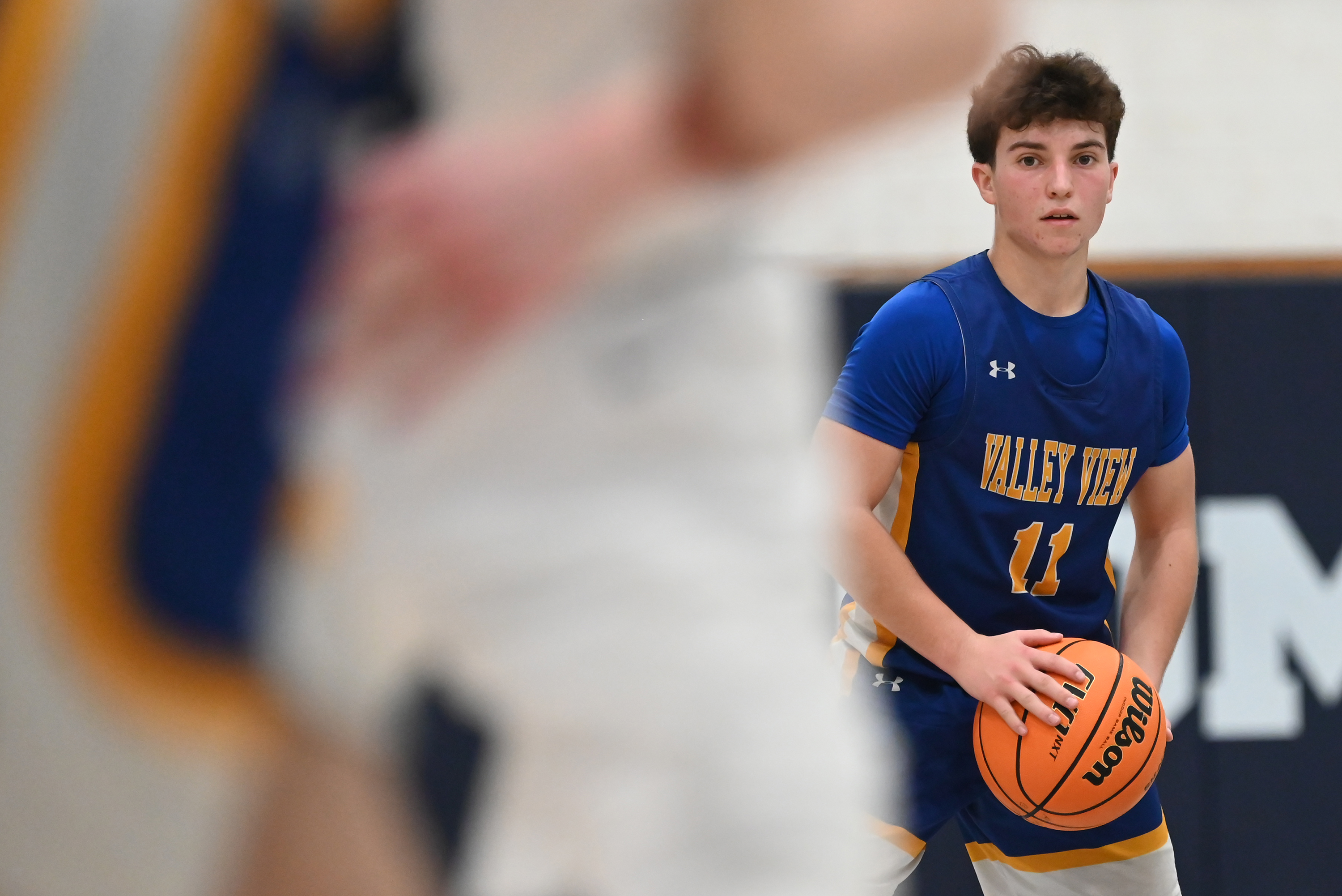 Valley View’s Aiden Plotkin holds the ball during the basketball...