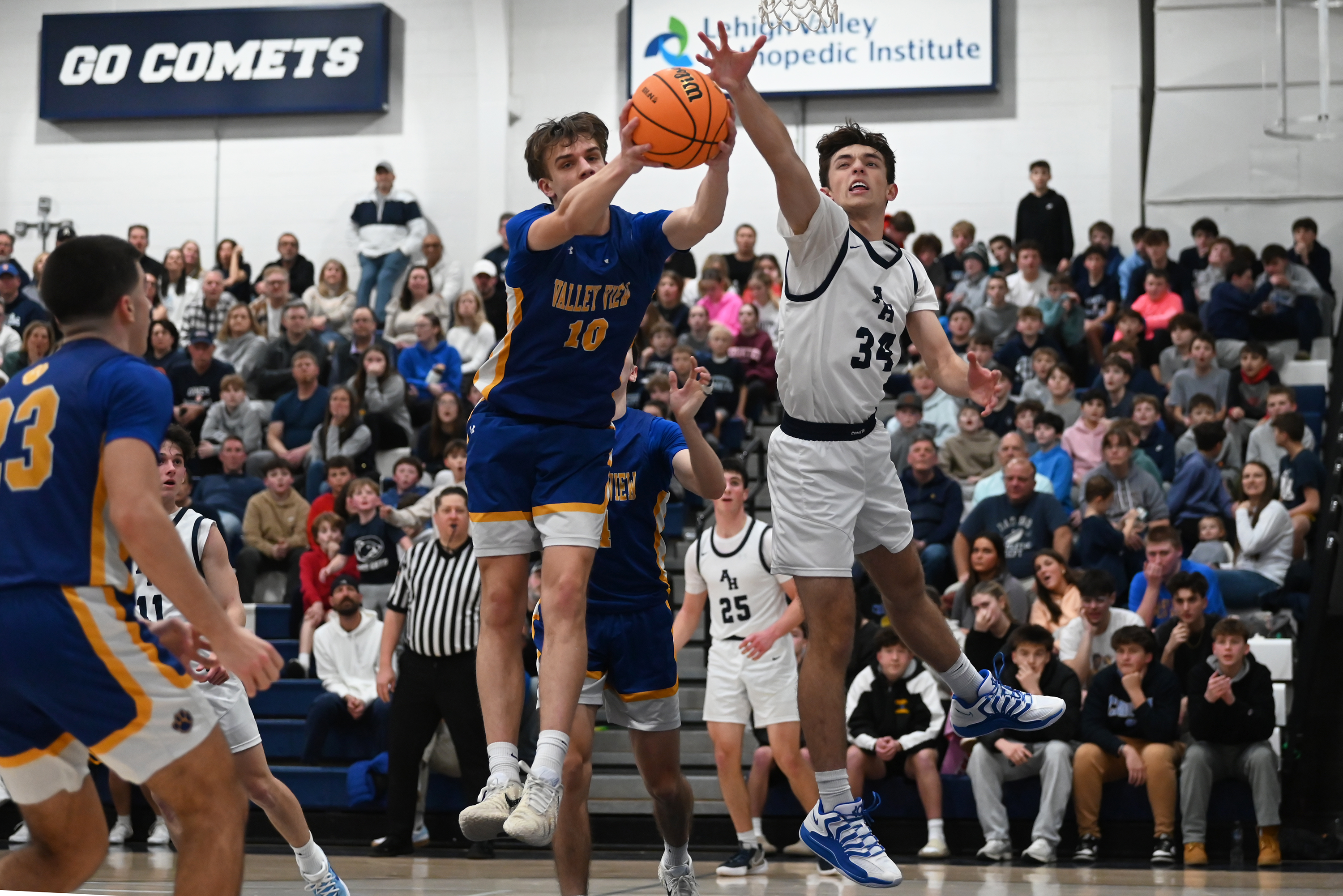 Valley View’s Noah Symuleski and Abington Heights’ Gavin Corwin reach...