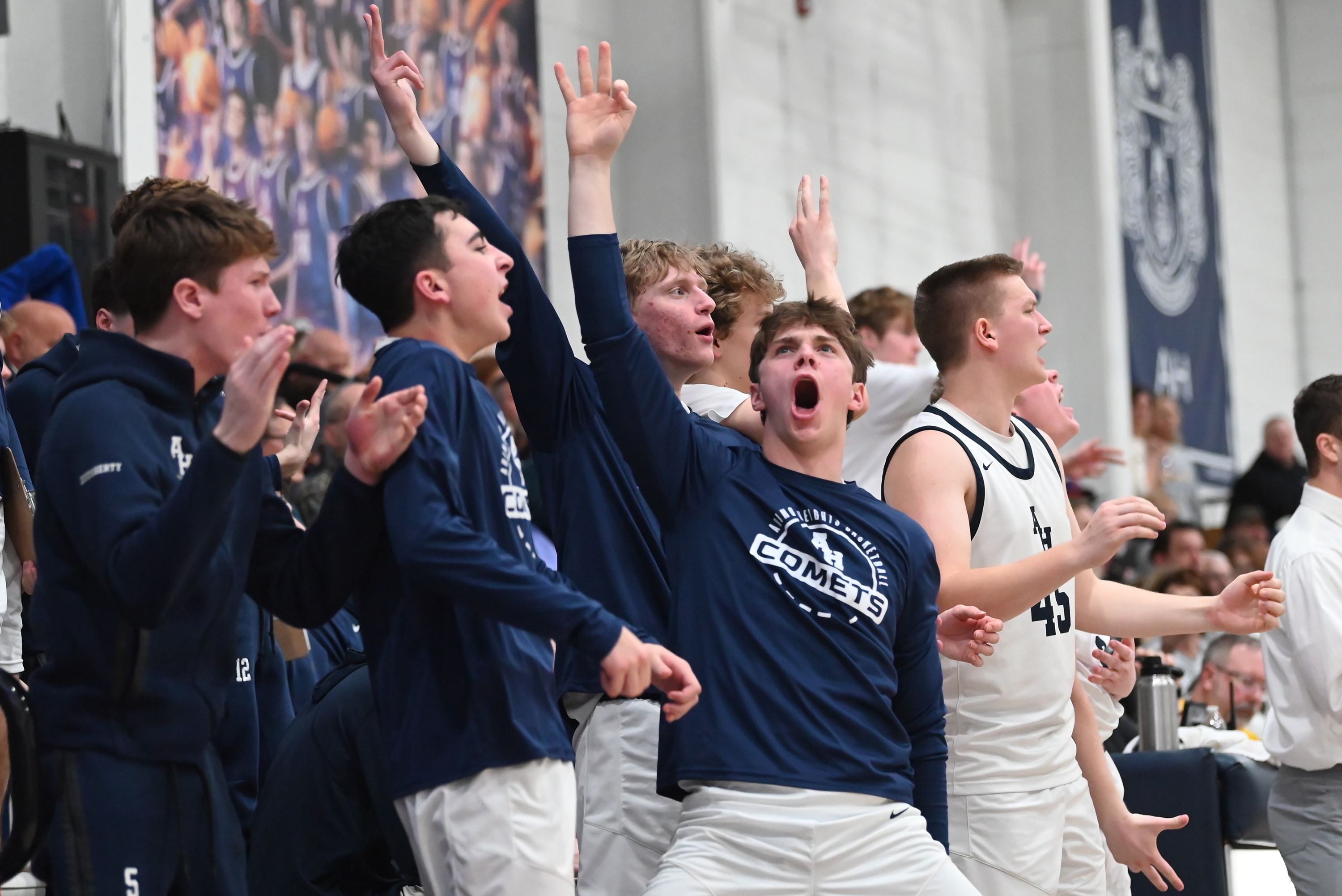 Abington Heights’ bench celebrates after their team scores during the...