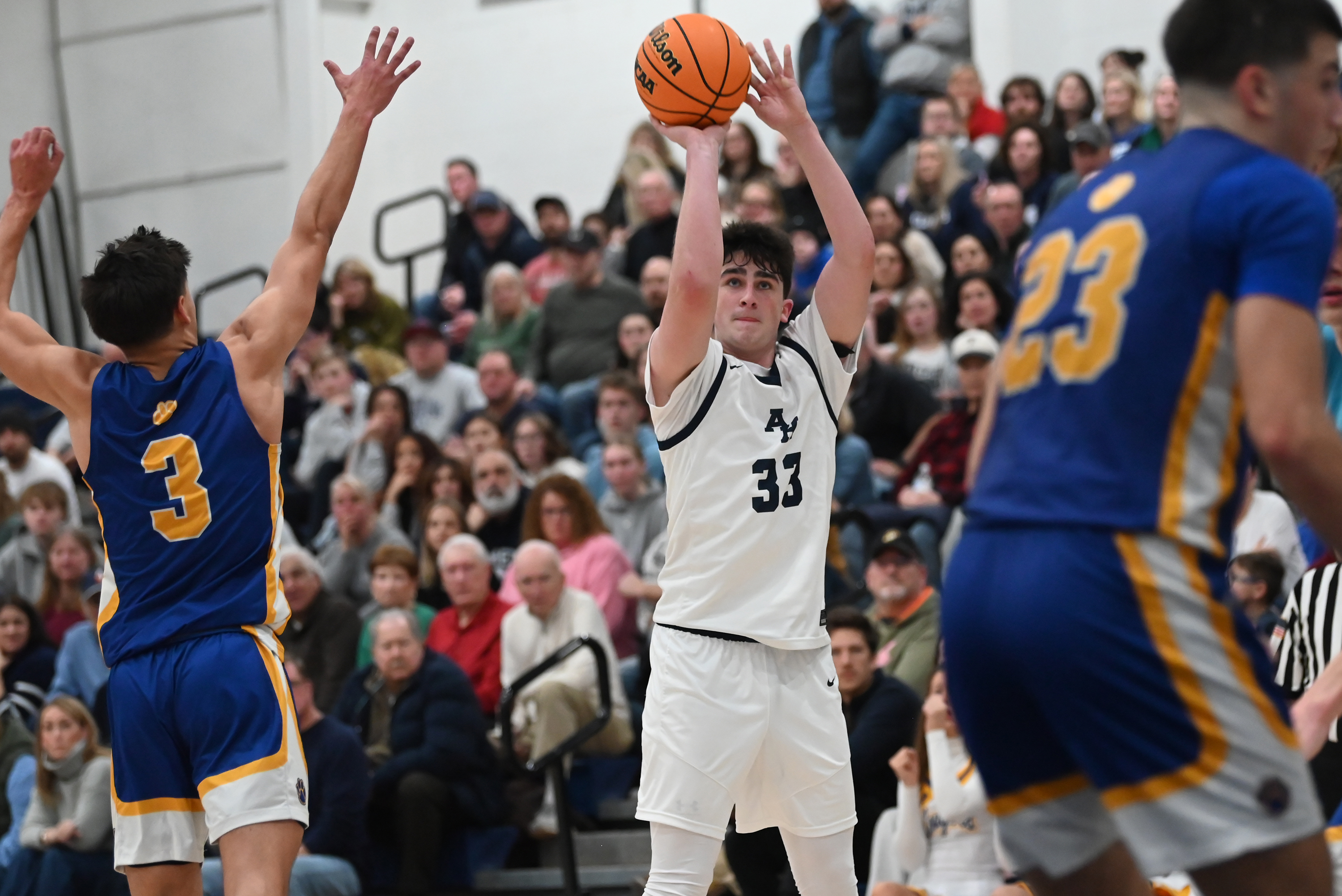 Abington Heights’ Jordan Shaffer takes a shot during the basketball...