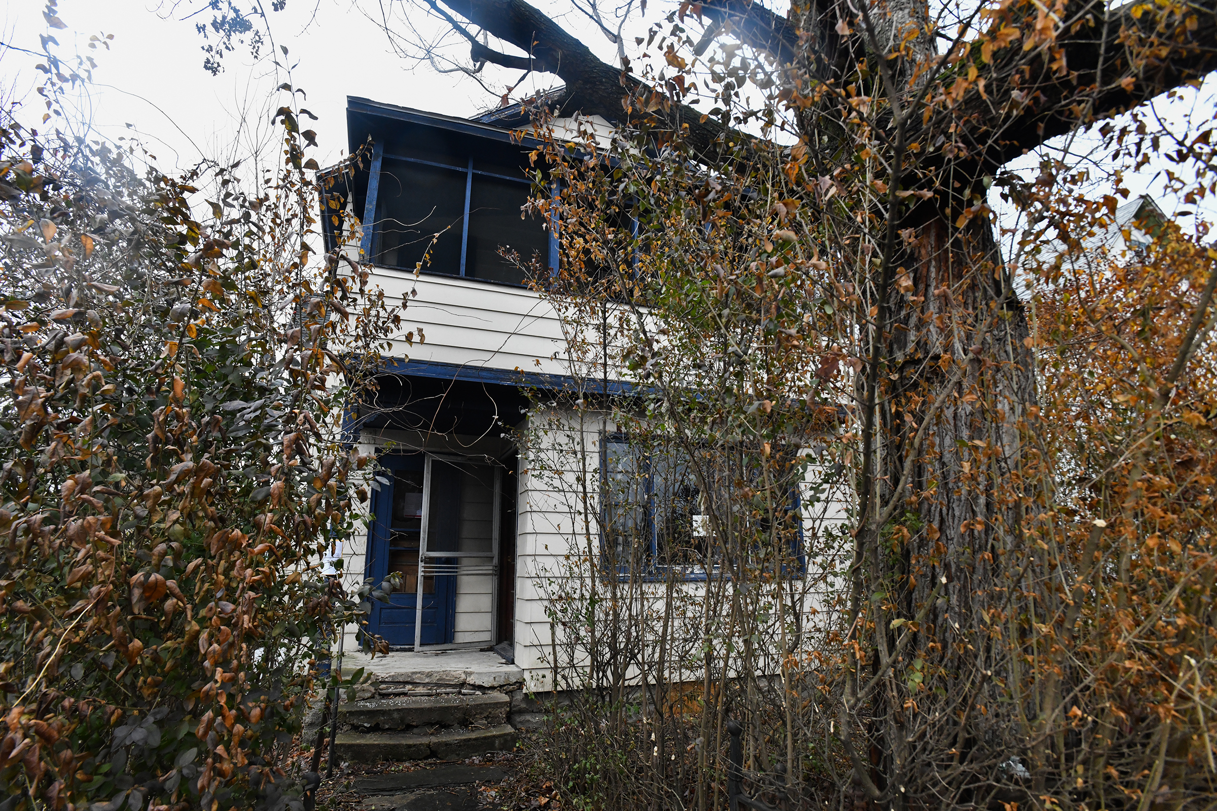 A blighted property sits condemned at 25 New York St....