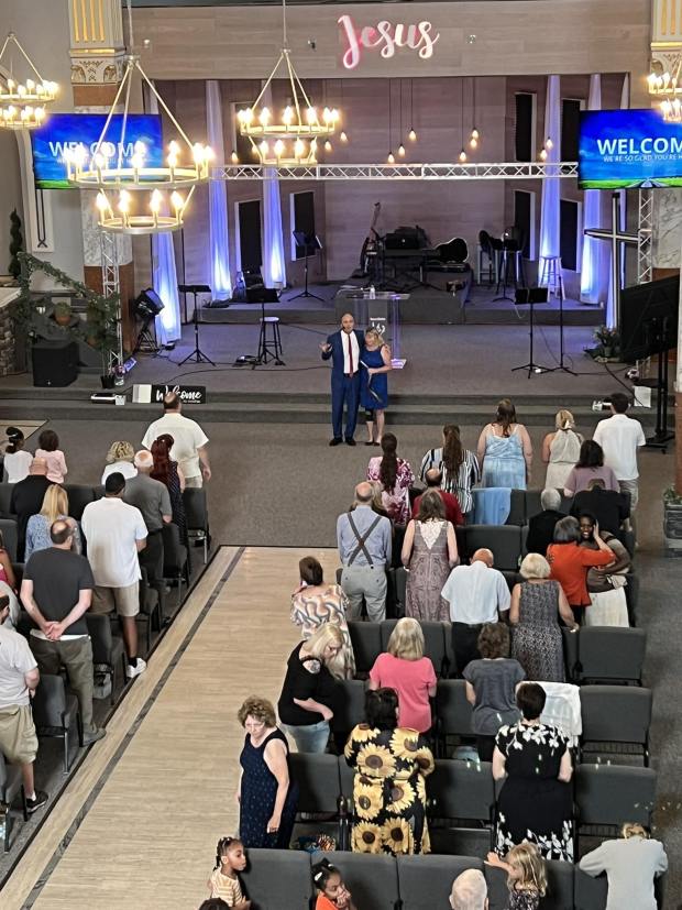 Pastor Jack Munley and his wife address Rescue and Restore Church in December of 2025. The Olyphant Church has grown in numbers and its commitment to the community, Munley said. (SUBMITTED)