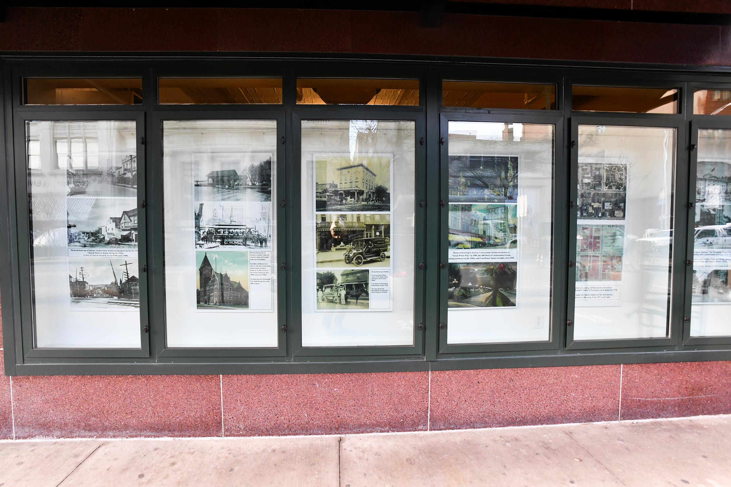 Old photos of city streets are reproduced from the Lackawanna...