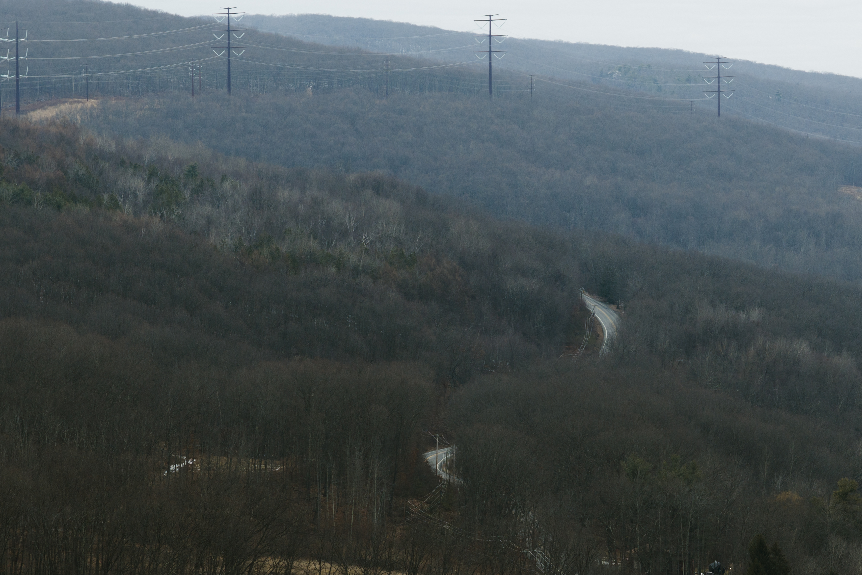 Wildcat Road winds up the mountain looking north towards a...