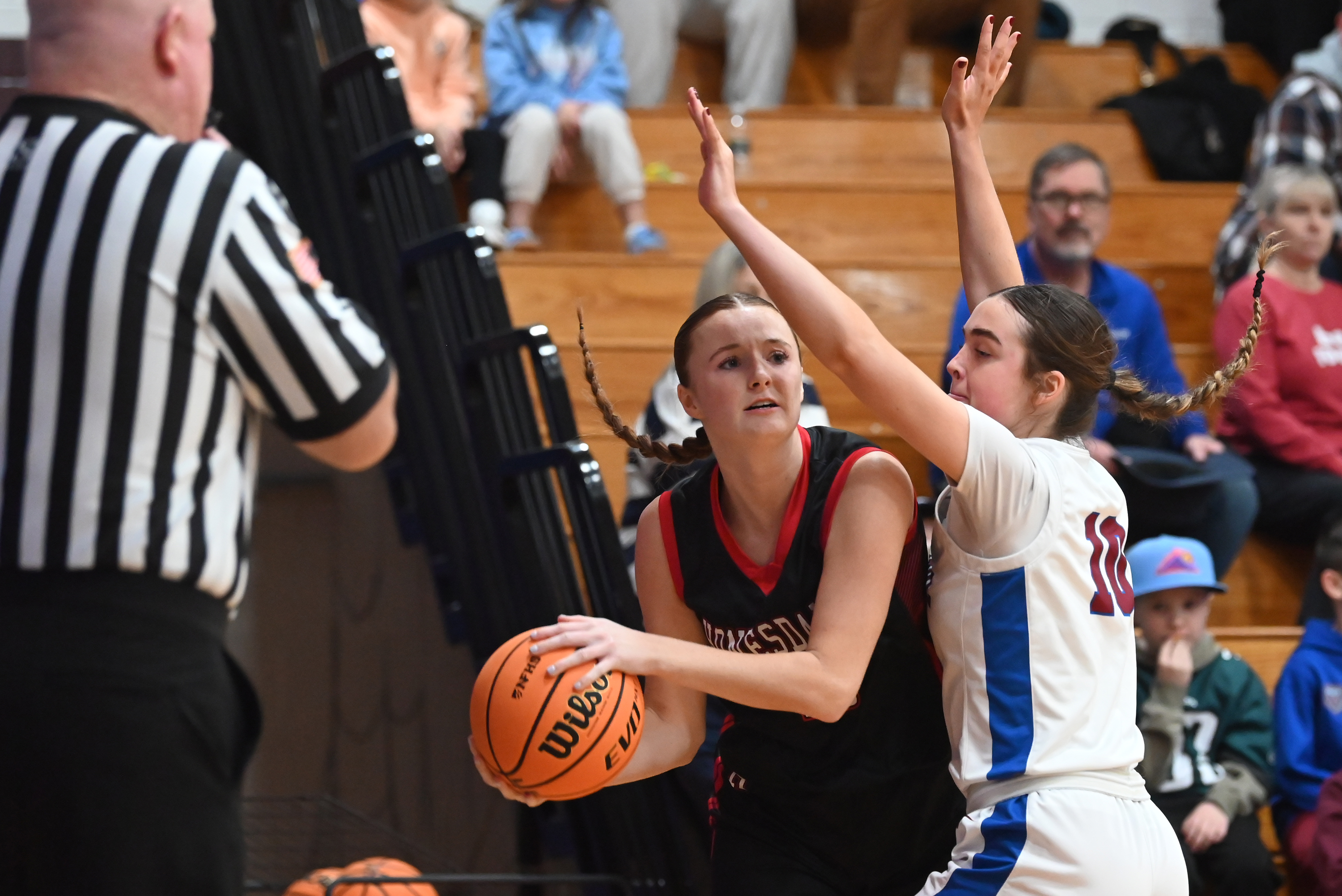 Dunmore’s Amanda Dempsey defends Honesdale’s Ruby Martin during the basketball...