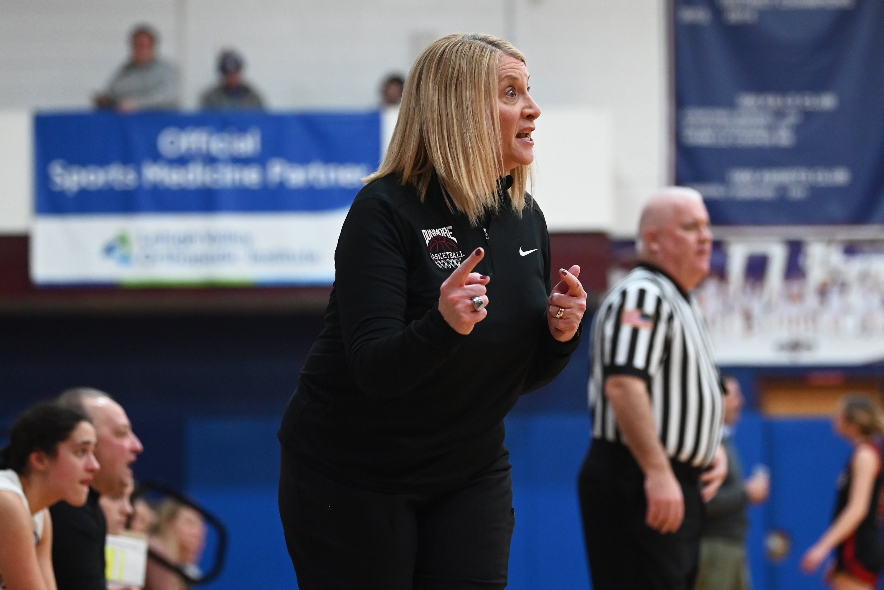 Dunmore’s head coach Carrie Toomey calls out to her players...