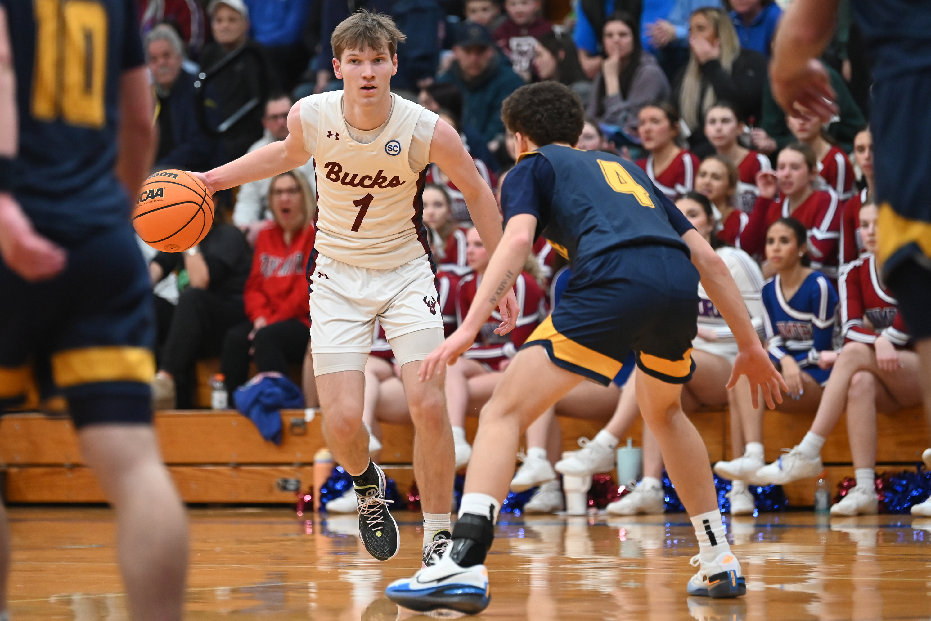 Old Forge’s Cameron Parker defends Dunmore’s Brayden Canavan during the...
