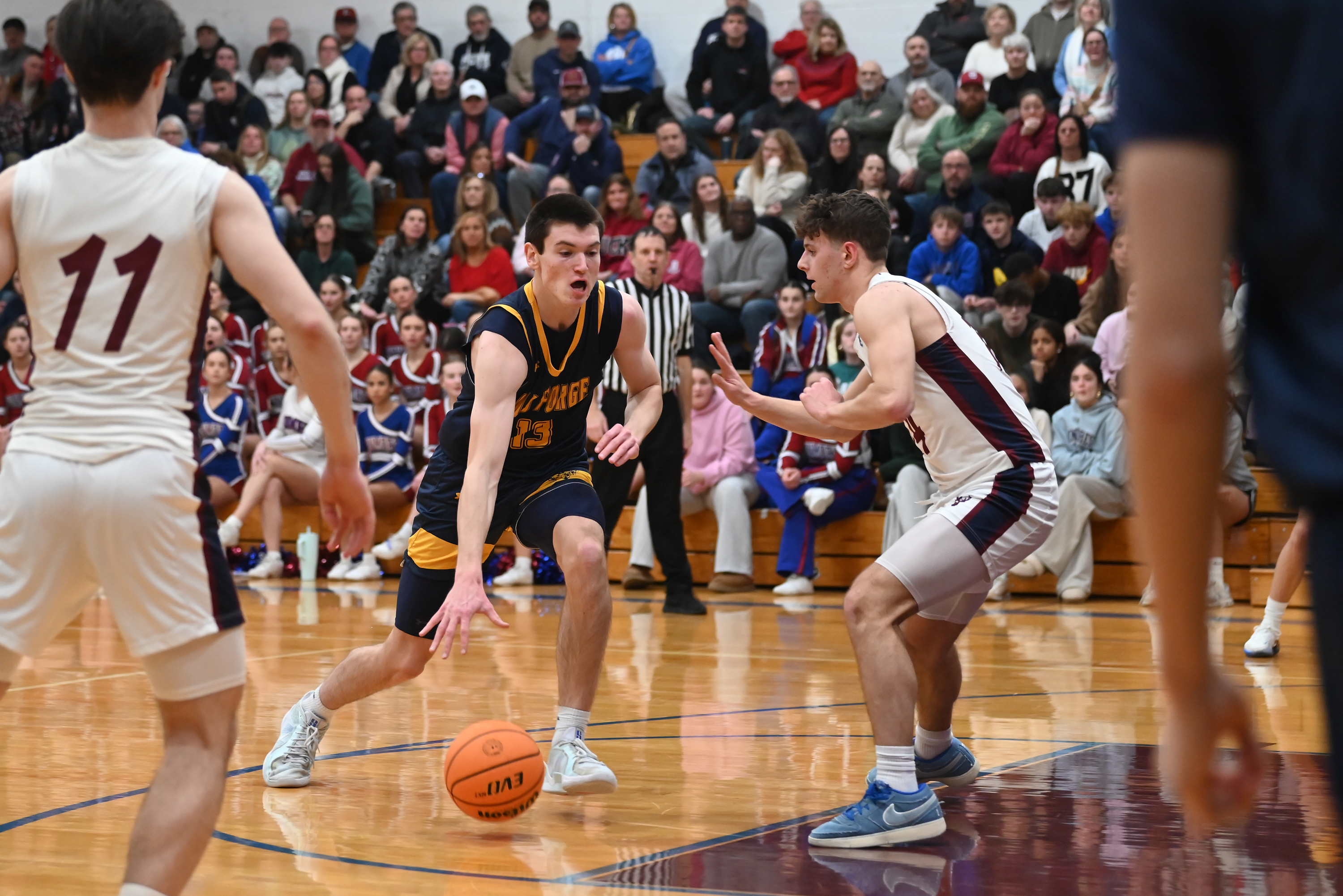 Old Forge’s Logan Fanning moves the ball during the basketball...