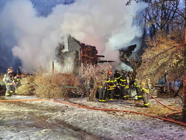 An early morning fire in Moosic destroyed a residence and displayed one. (SUBMITTED)