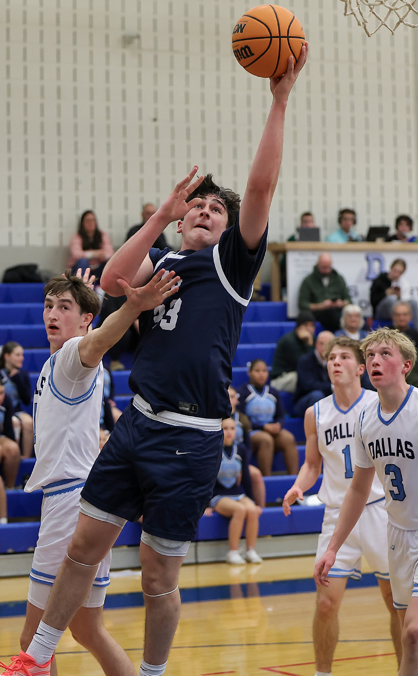 Abington Heights’ Jordan Shaffer (33) drives the ball past Dallas’...