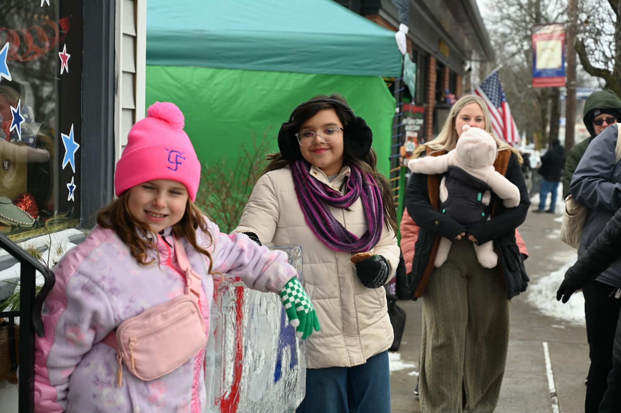 Youngsters enjoy an ice sculpture at the Clarks Summit Festival...