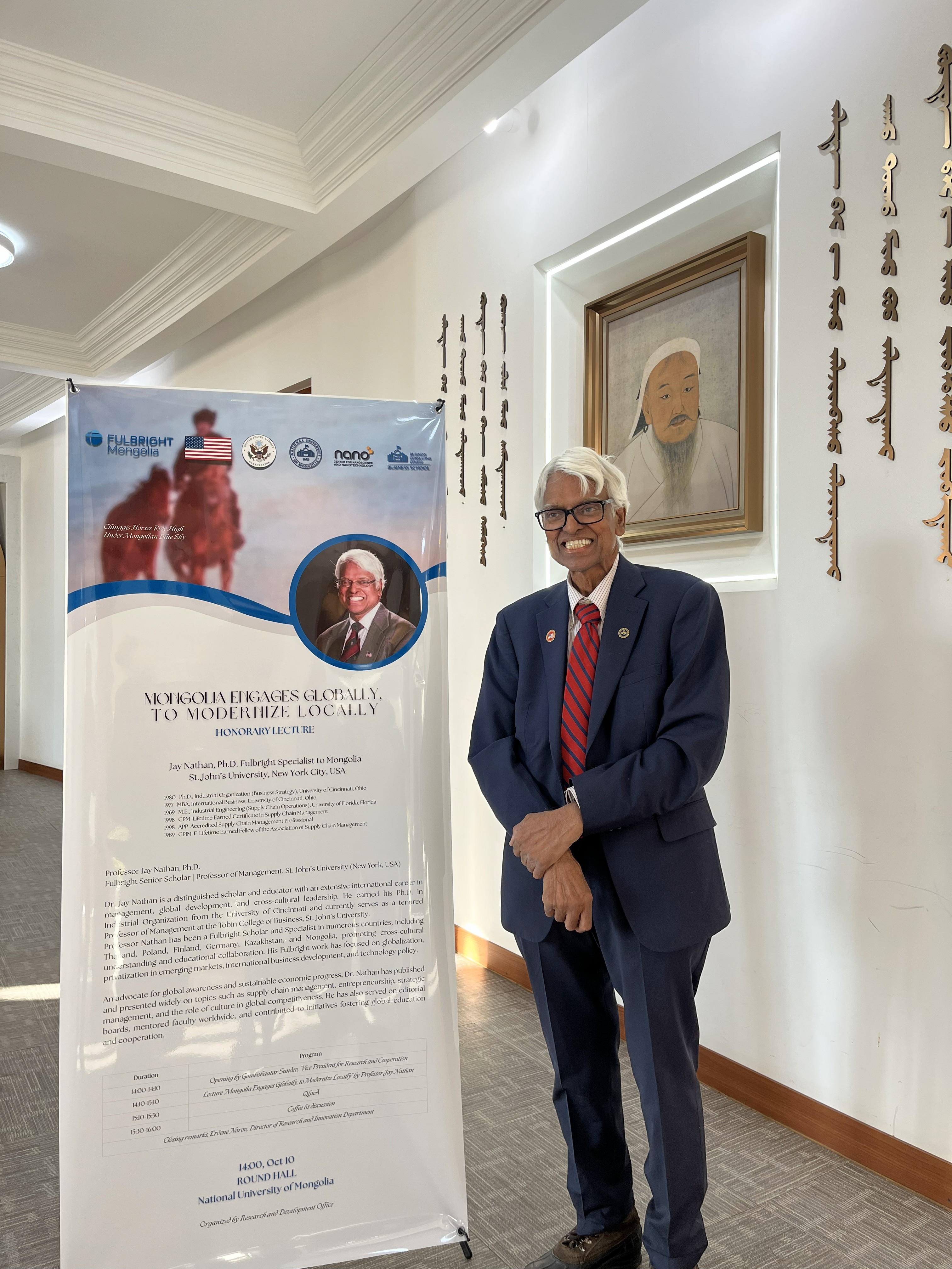 Jay Nathan, Ph.D., poses for a photo after a lecture...