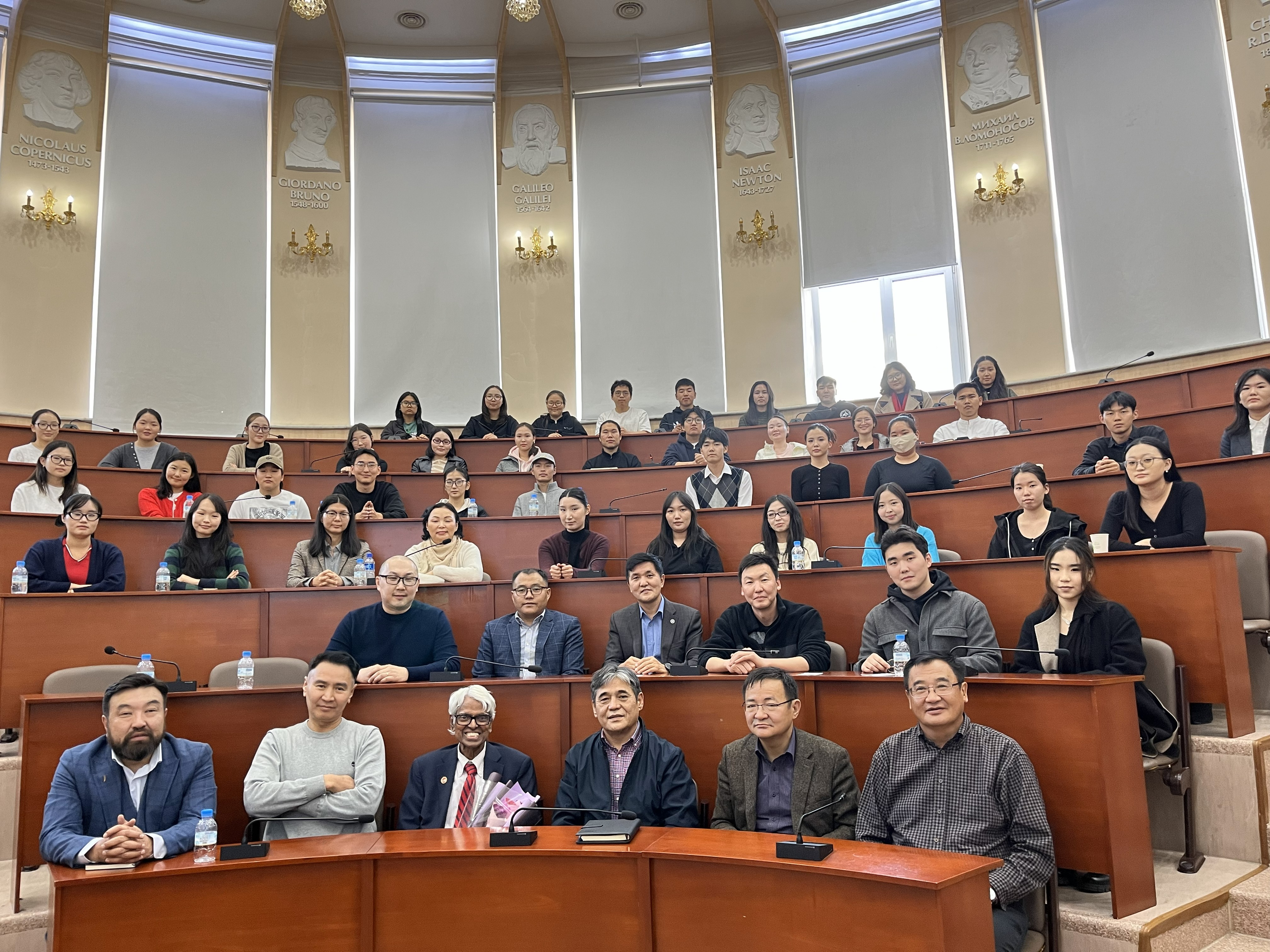 Jay Nathan, Ph.D., poses with students, faculty and administrators at...