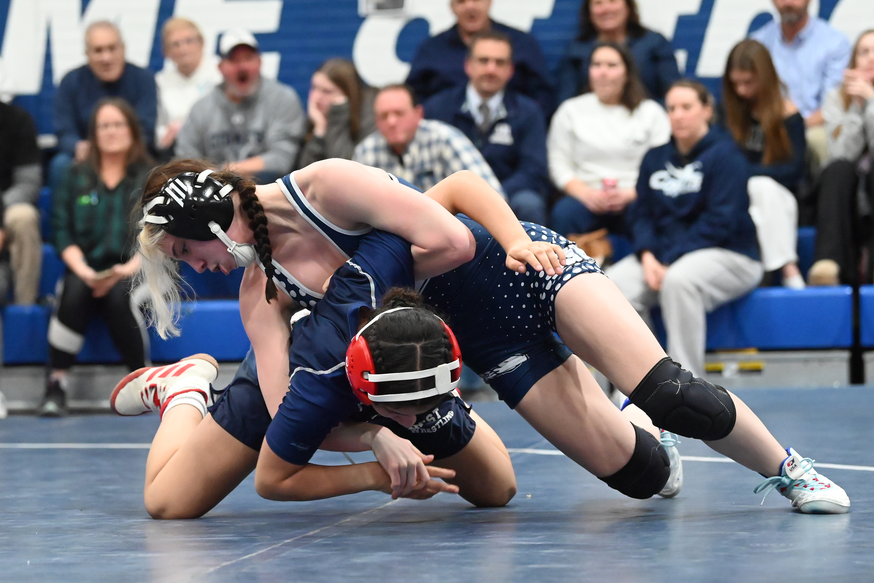 West Scranton’s Jocelyn Suhow Sanchez, bottom, and Abington Heights’ Zoey...
