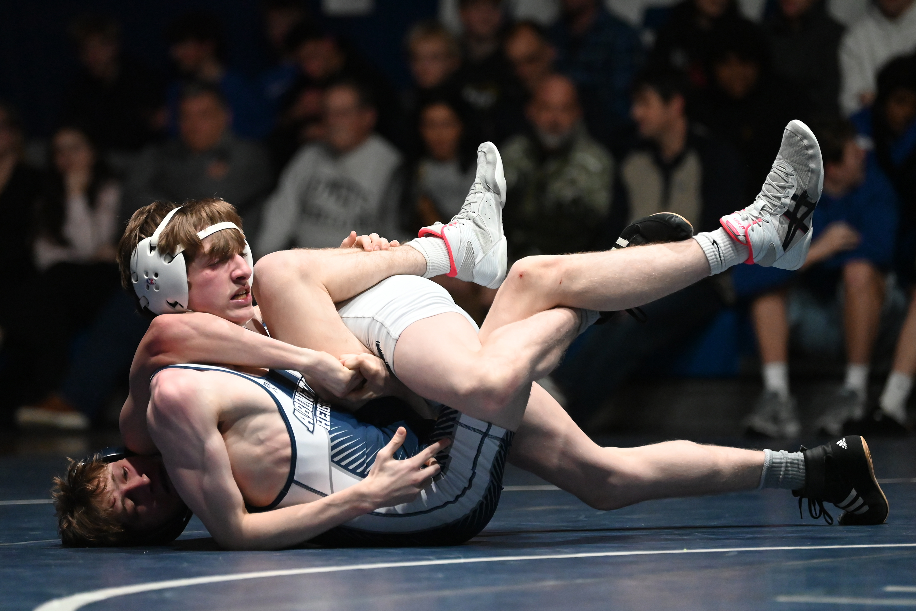 Abington Heights’ J.J. Beck, front, and West Scranton’s Connor LaGier...