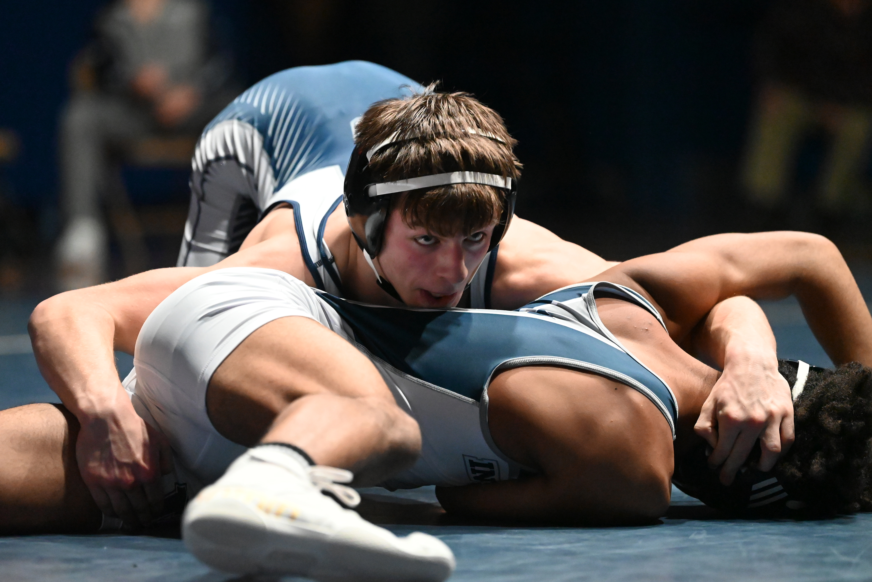 Abington Heights’ Edward Reed, top, and West Scranton’s Reggie Rollins...