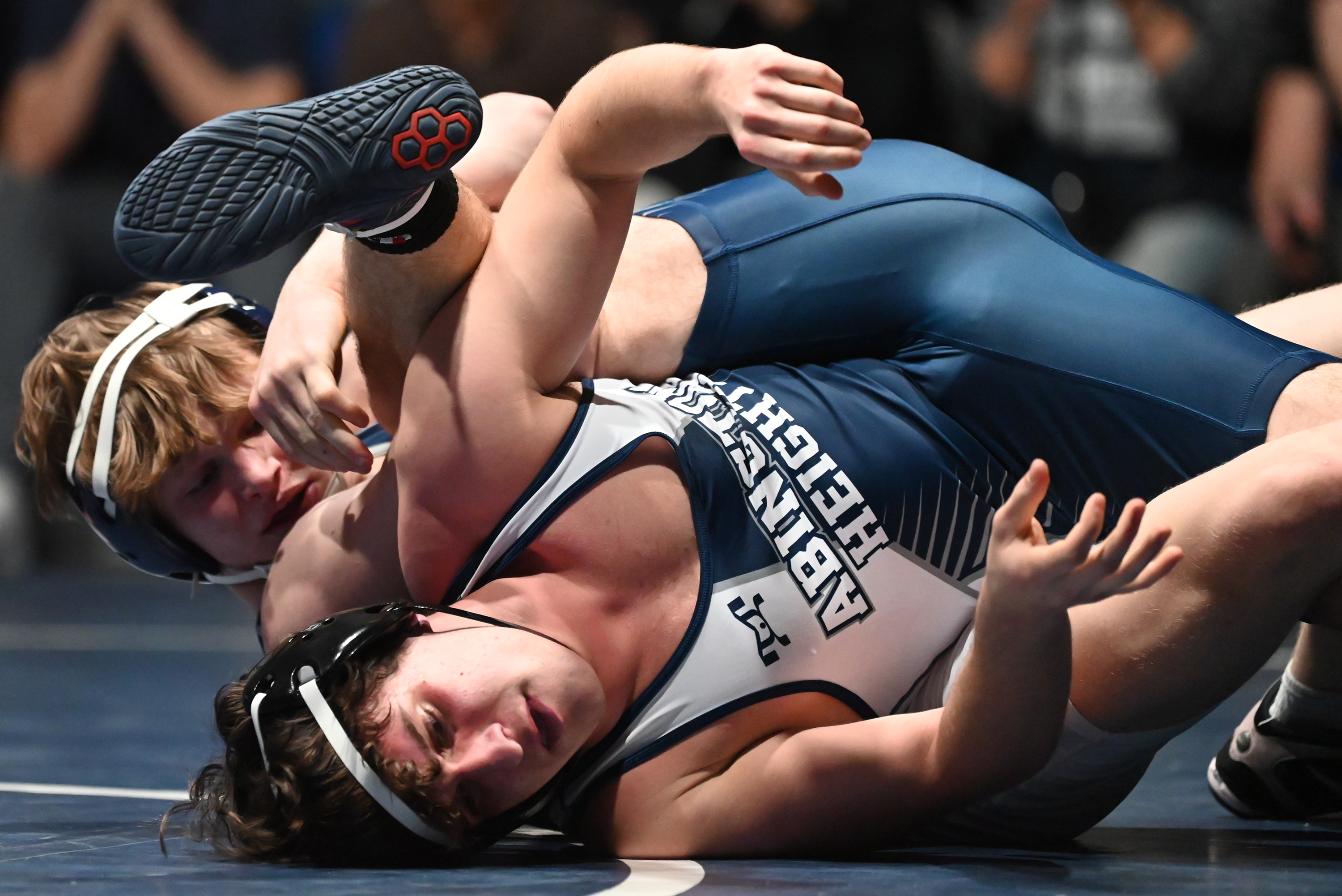 West Scranton’s Tommy Schechterly, back, and Abington Heights’ Coen Holland...