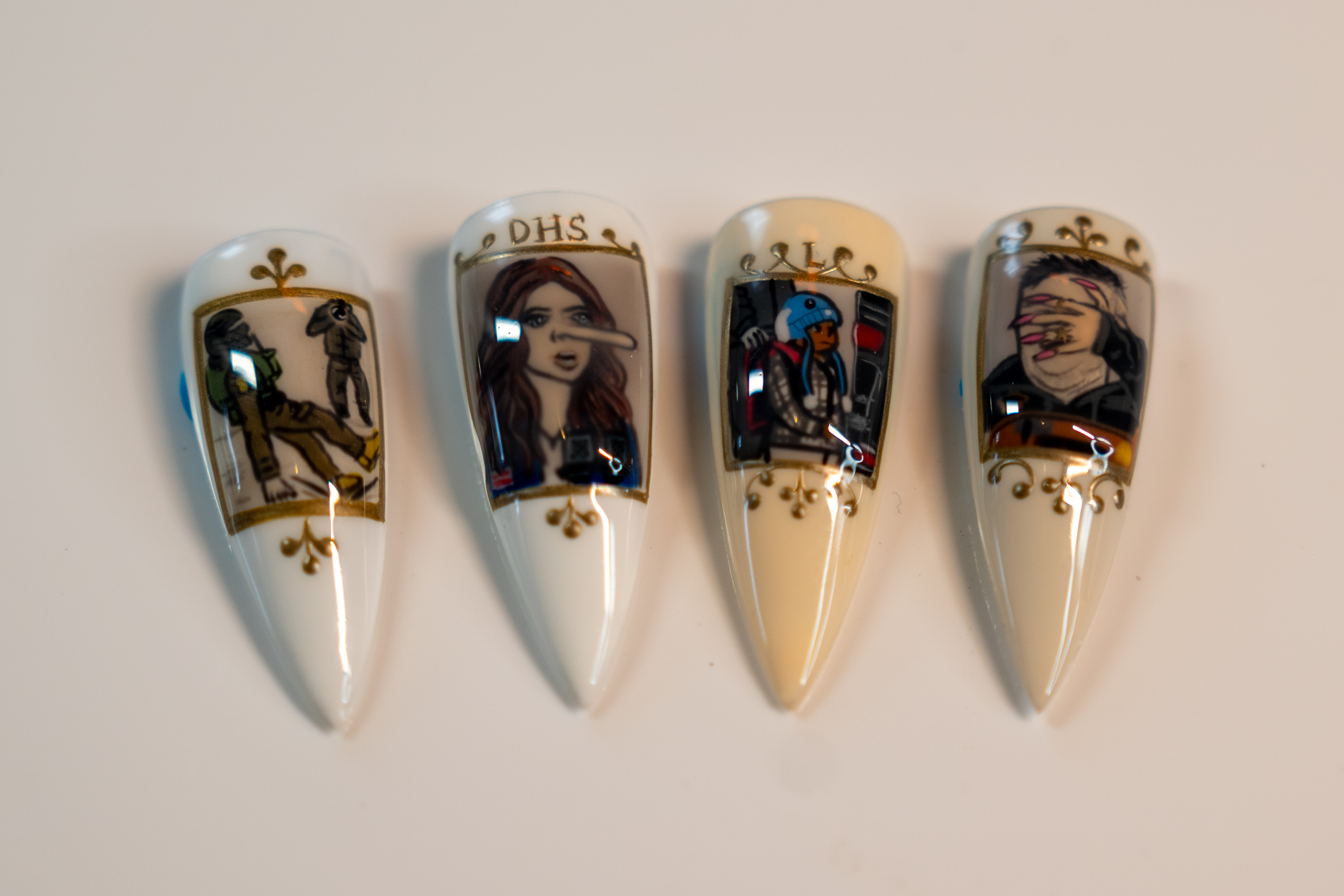 Artist Heather Buzzell’s anti-ICE nail set at Buzzell’s workspace in...