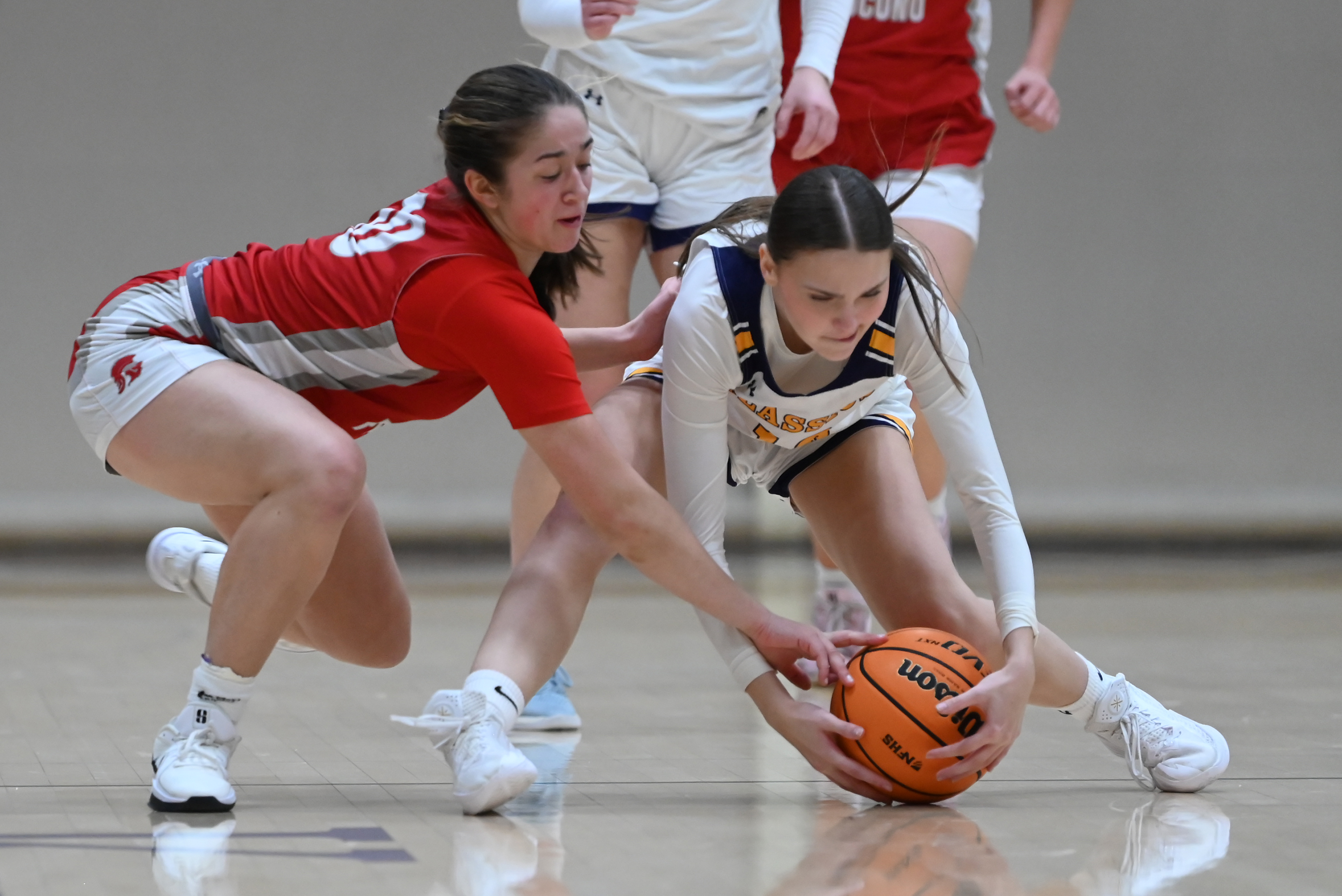 North Pocono’s Ella Clementoni fights Scranton Prep’s Shannon Bestrycki for...