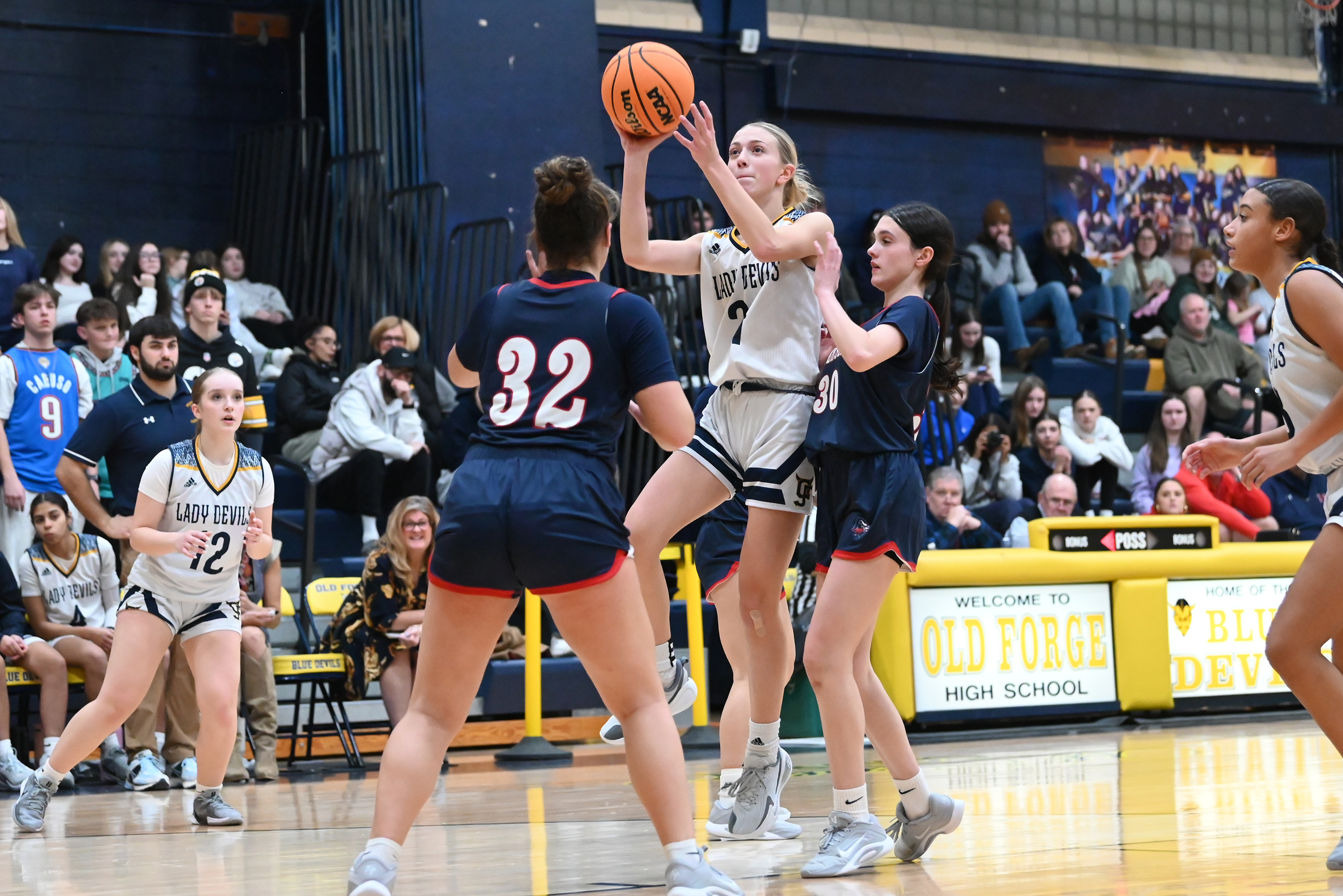Old Forge’s Ava Arnold takes a shot during the basketball...