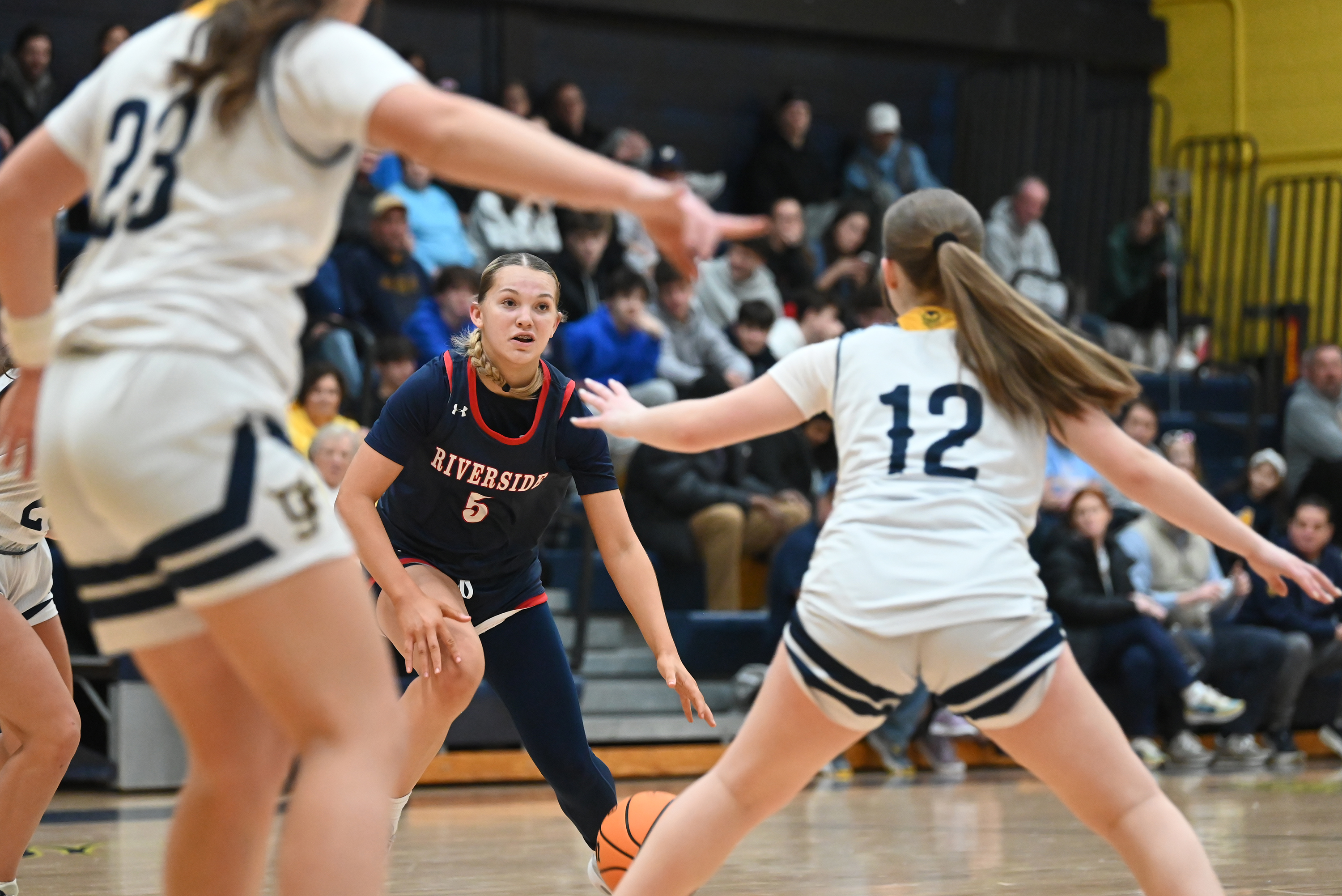 Riverside’s Faith Pavalonis attempts to evade Old Forge’s defense during...