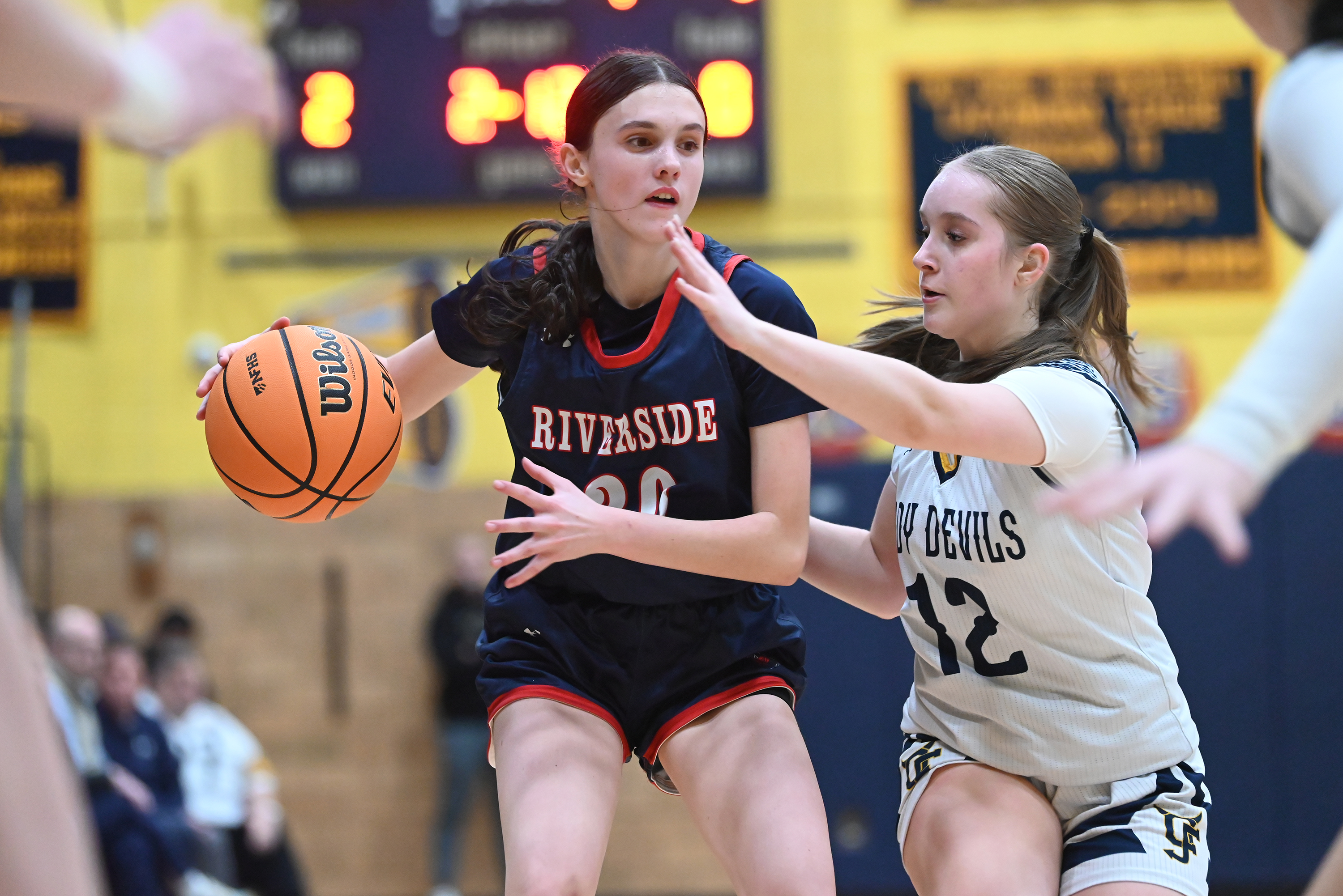 Old Forge’s Mikaela Lohman defends Riverside’s Caitie Beecham during the...