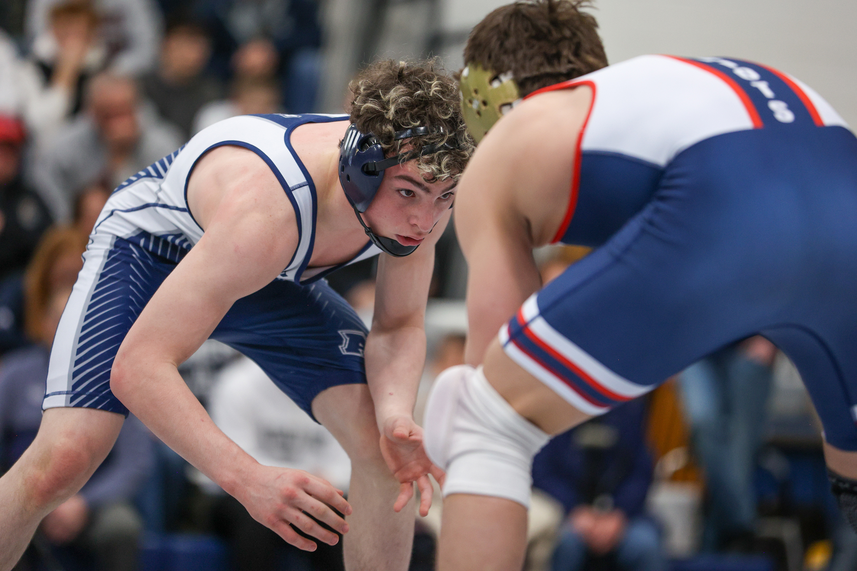 Abington Heights’ Lucas Drake, left, wrestles Pittston Area’s Ethan Aftewicz...