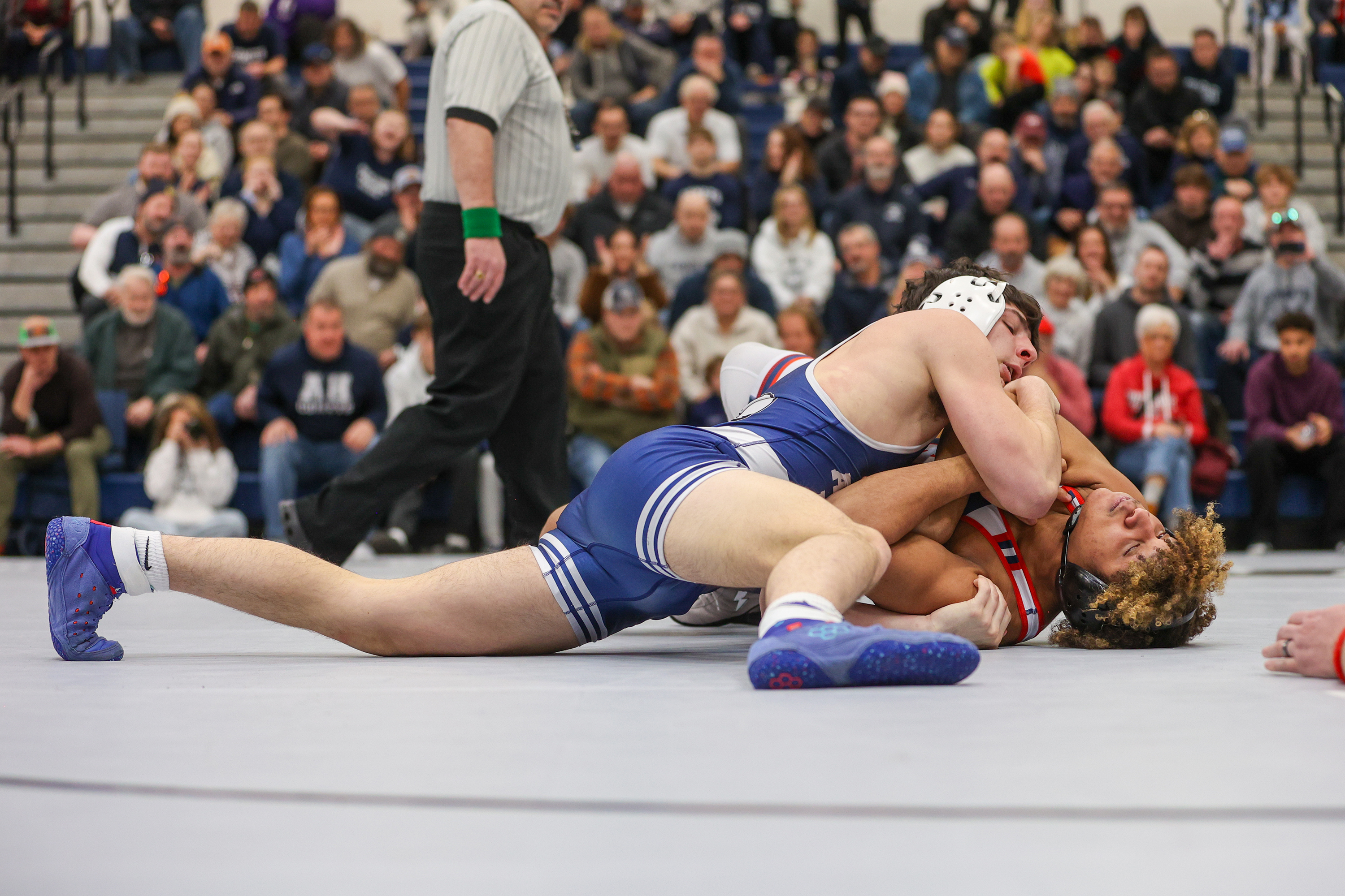 Abington Heights’ Jack Kotchick, left, holds down Pittston Area’s Johanzel...