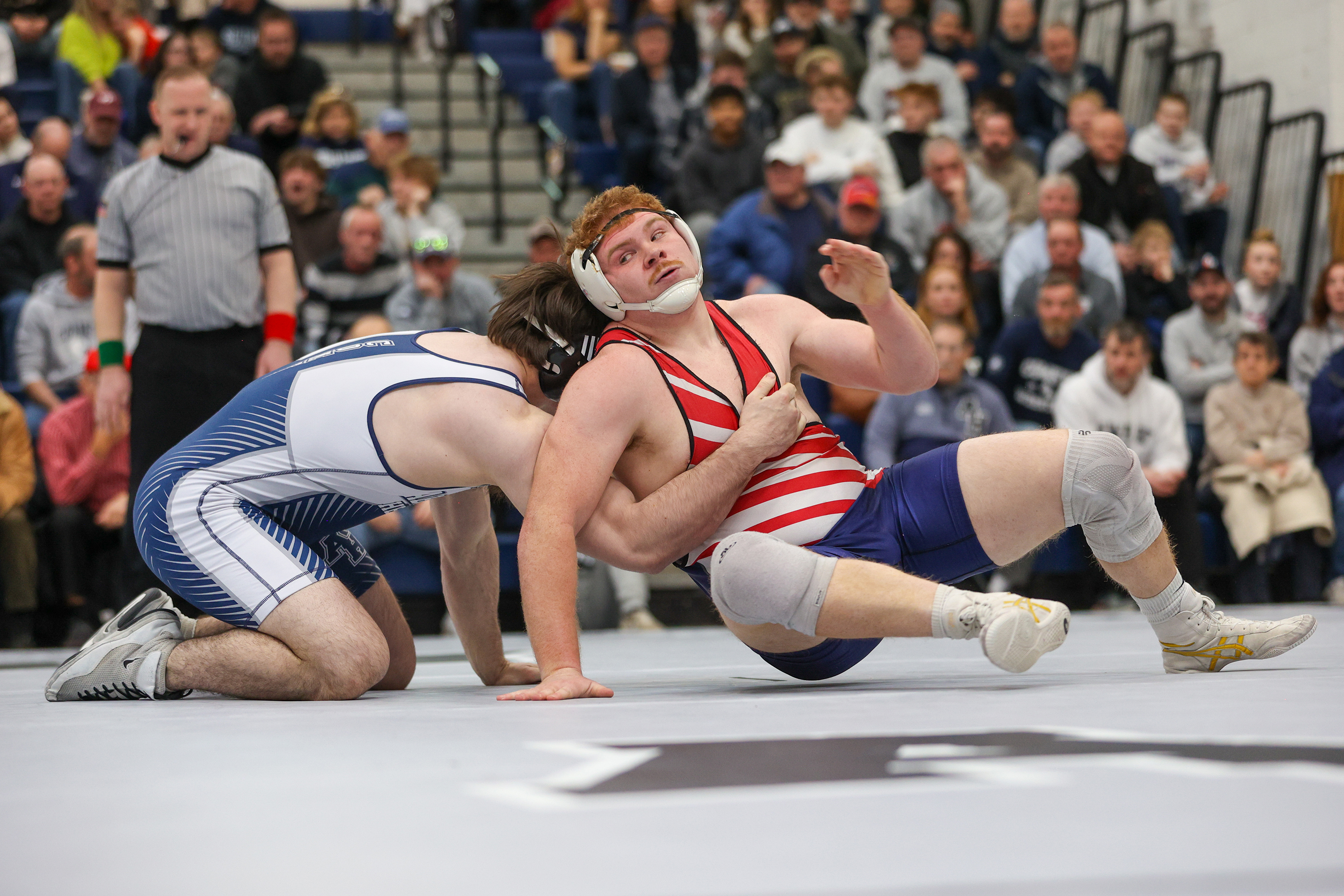Pittston Area’s Brody Spindler, right, maneuvers around Abington Heights’ Frank...
