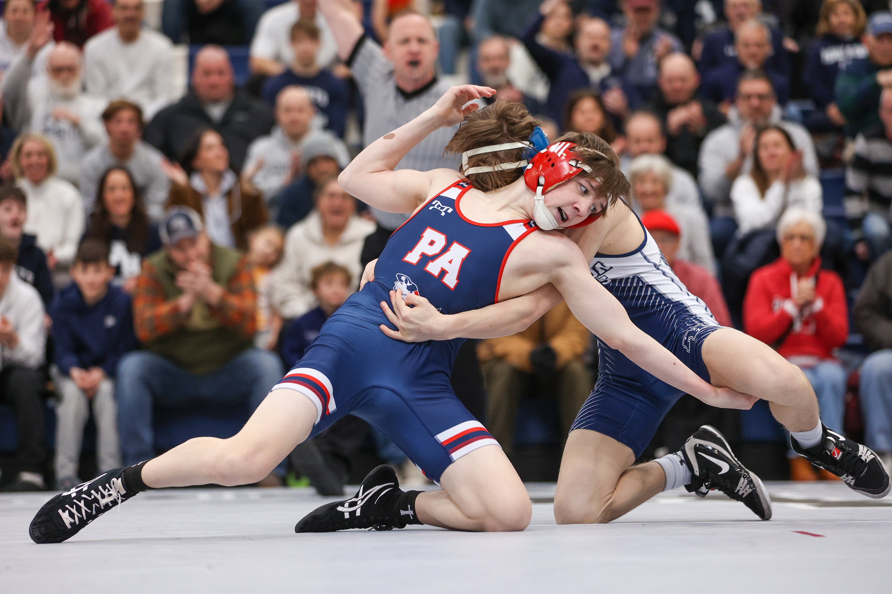 Pittston Area’s David Krantz, left, wrestles Abington Heights’ Lucas Kareha...