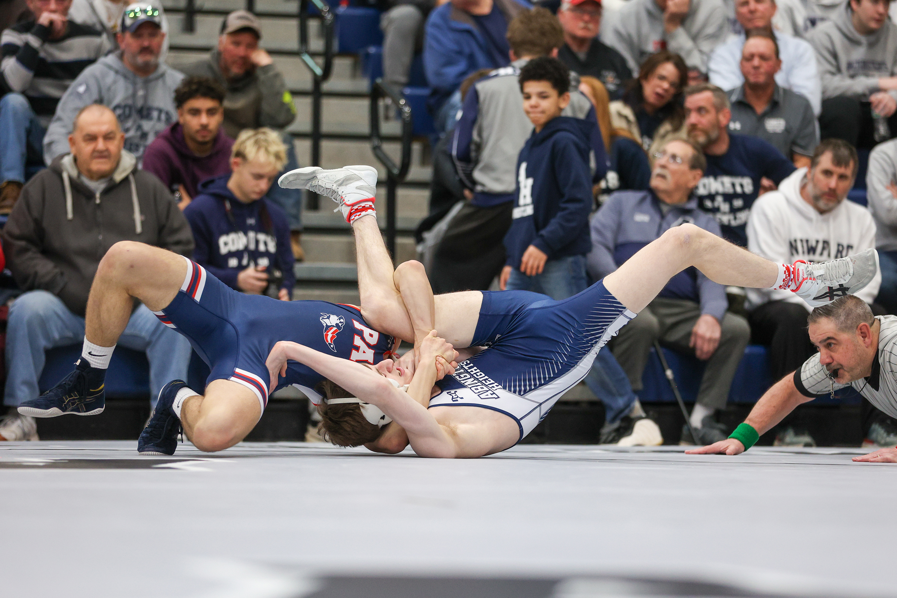 Pittston Area’s Tibor Toth, left, pins Abington Heights’ J.J. Beck...