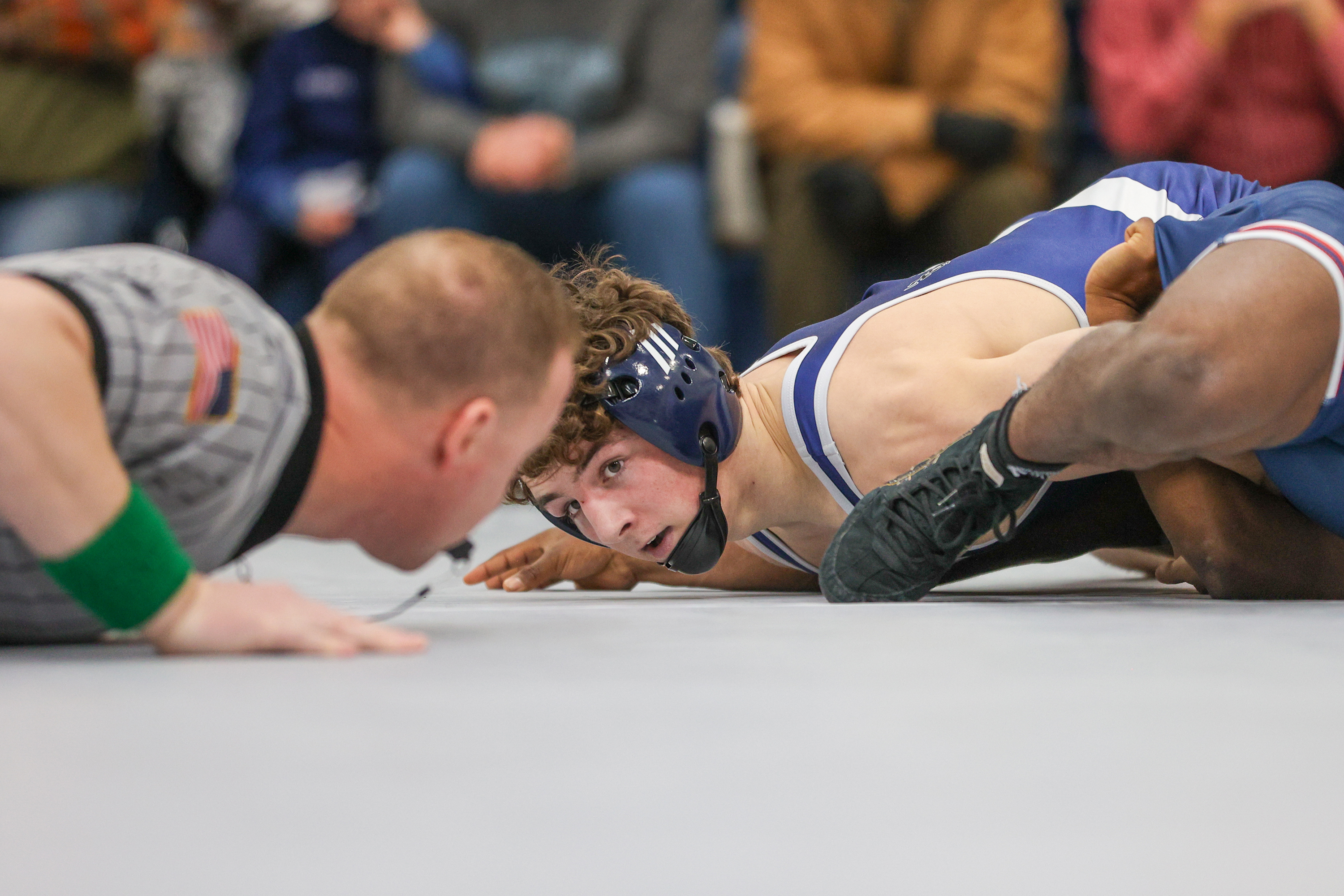 Abington Heights’ Mason Whitney looks to the official while holding...
