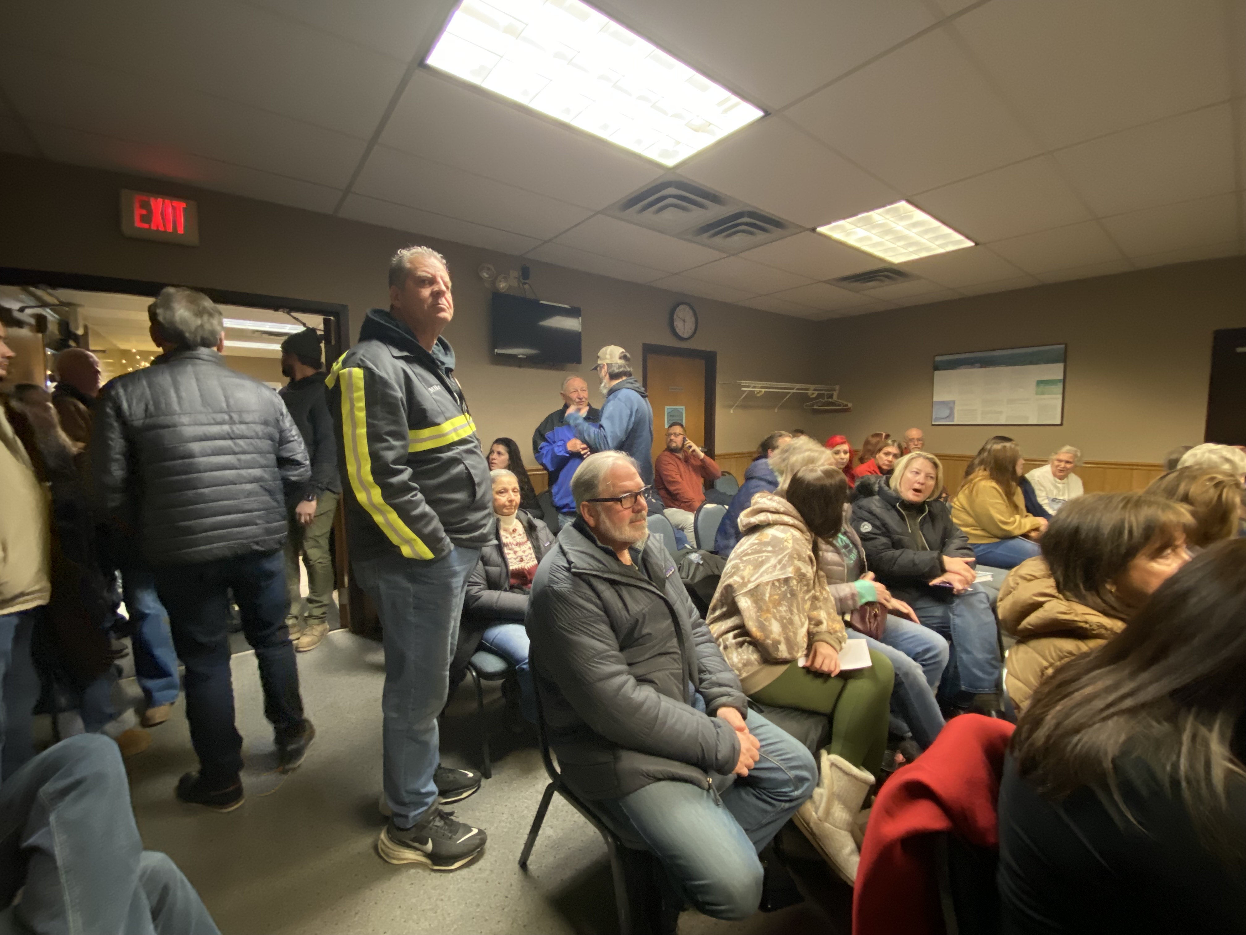 People pack the Ransom Twp. Municipal Building Thursday, Jan. 15,...
