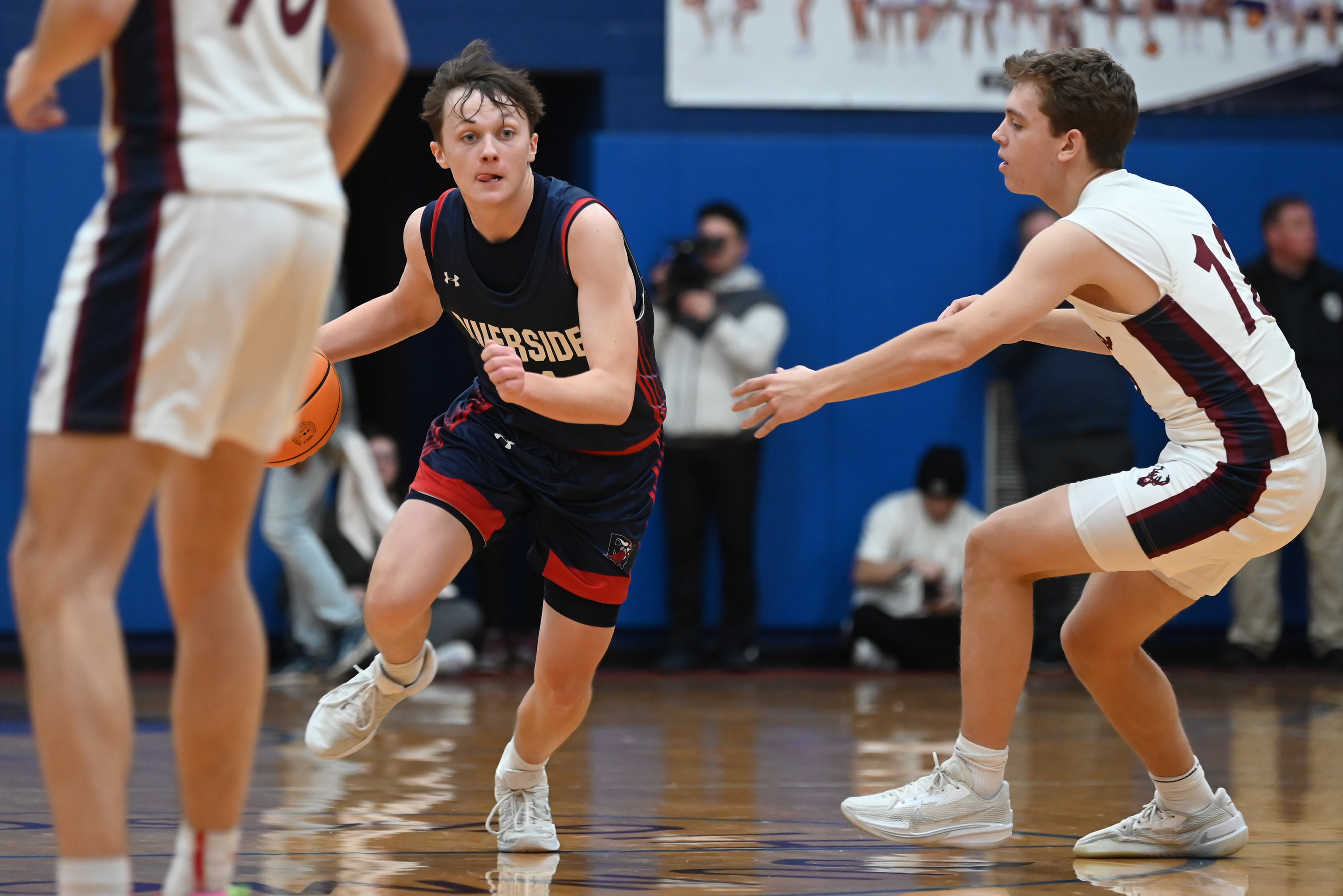 Dunmore’s Jimmy Clark defends Riverside’s Kyle Connor during the game...