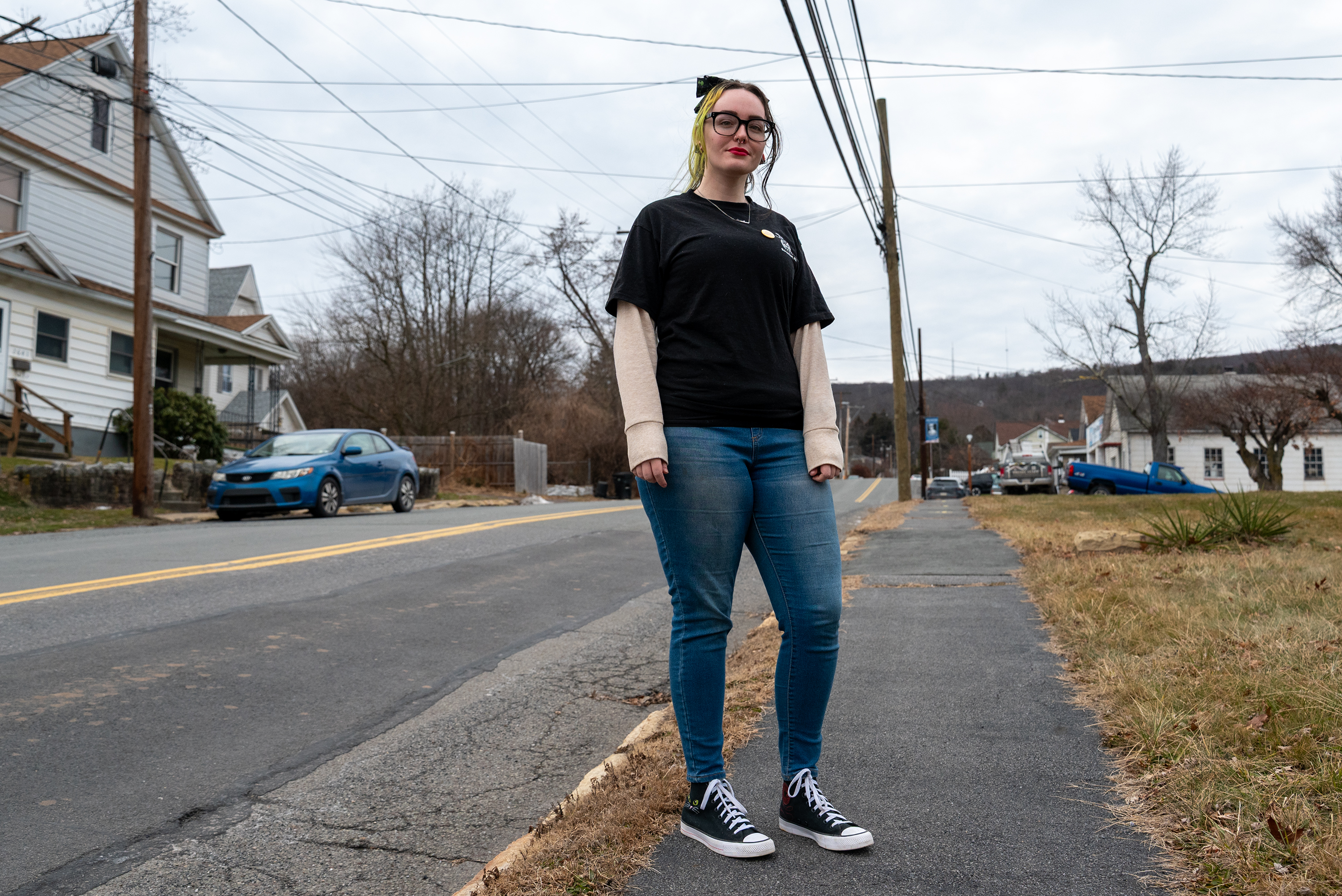 Keyser Valley resident Hayley Schaffer stands on the sidewalk outside...