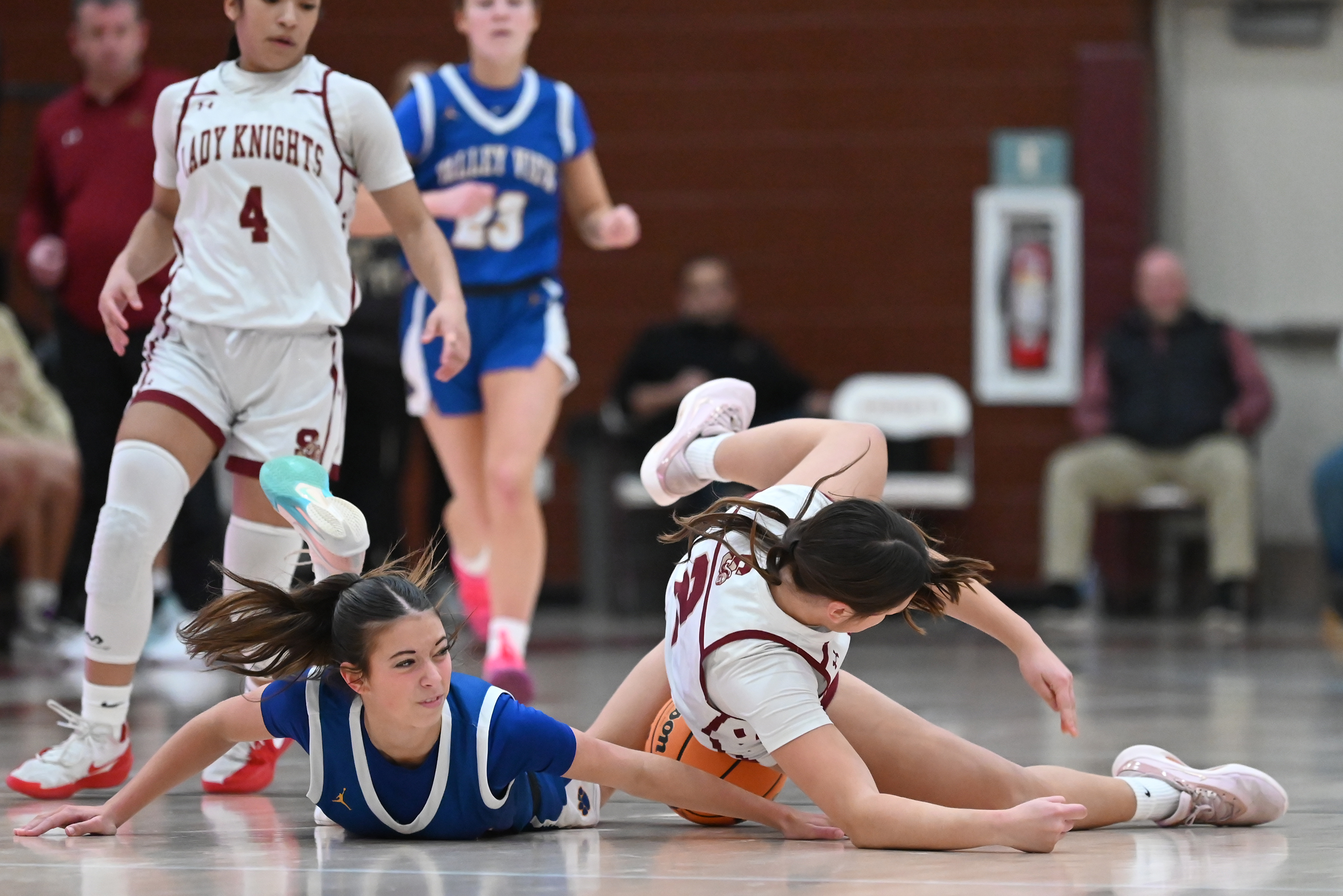 Valley View’s Mady Minelli and Scranton’s Chrissy Jacklinski compete on...