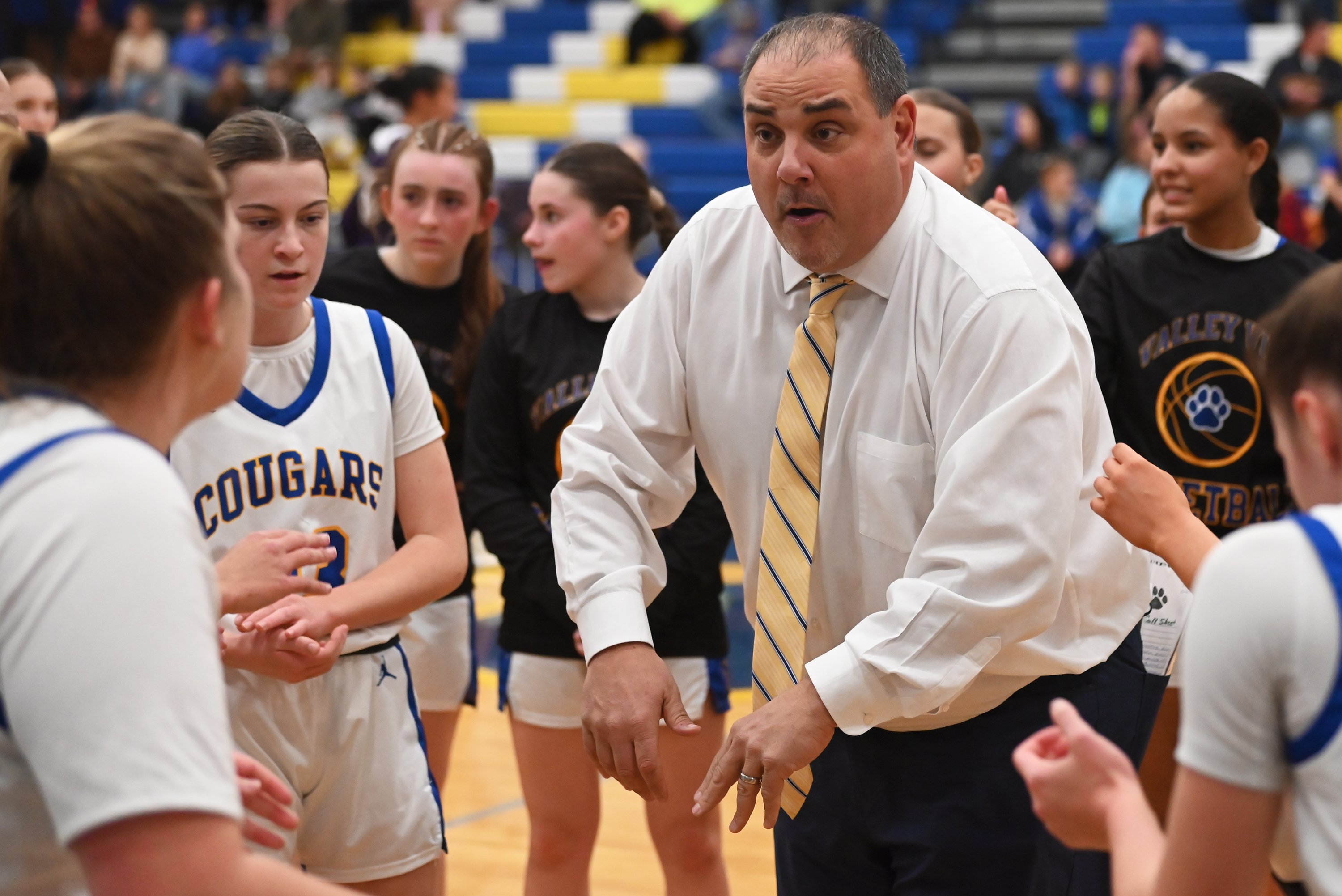 Valley View’s head coach Robbie Martin talks to his players...