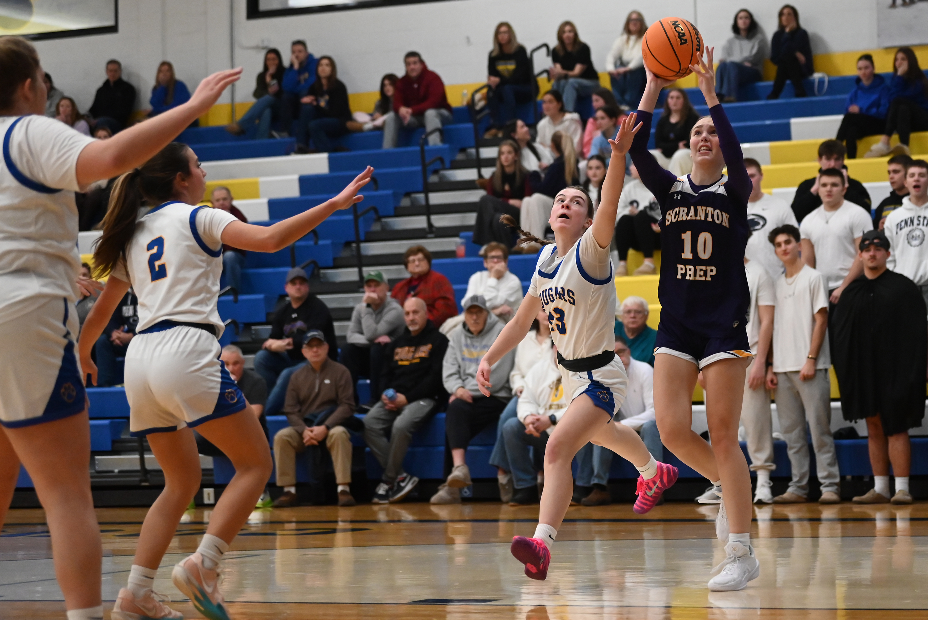 Scranton Prep’s Shannon Bestrycki shoots during the basketball game at...