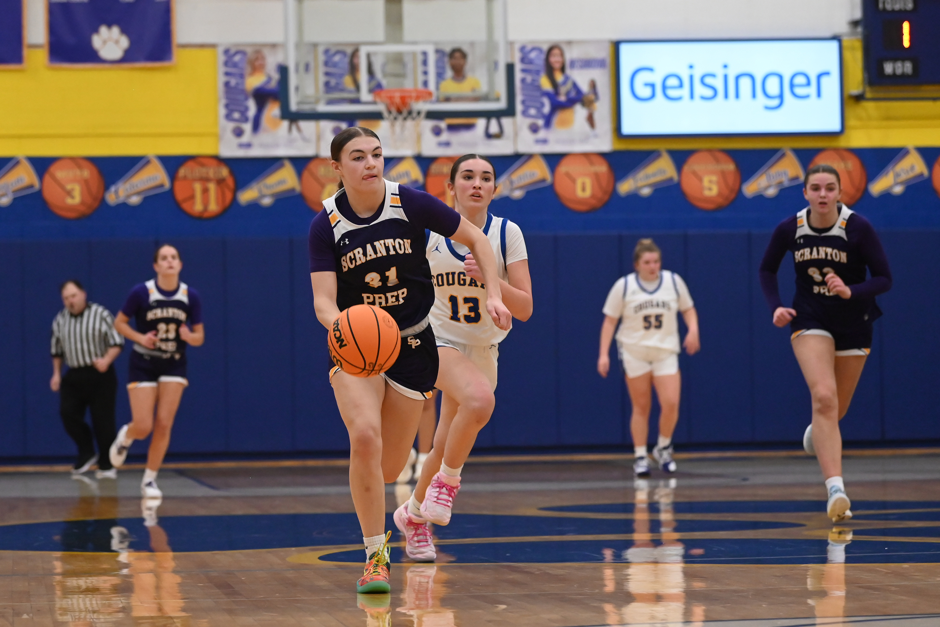 Scranton Prep’s Eva Kaszuba dribbles the ball during the basketball...