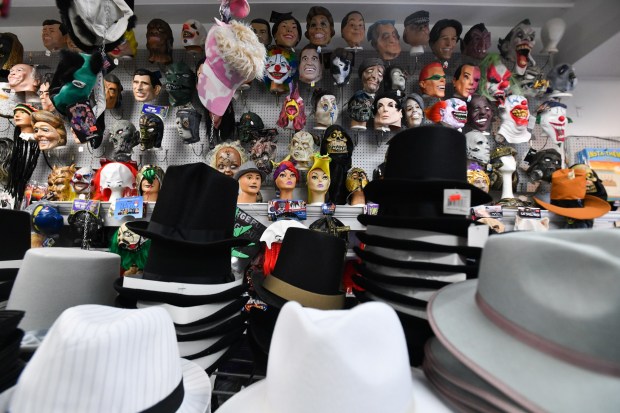 Masks hang on the wall in Taney's Costume Shop in Scranton Monday, January 19, 2026. (SEAN MCKEAG / STAFF PHOTOGRAPHER)