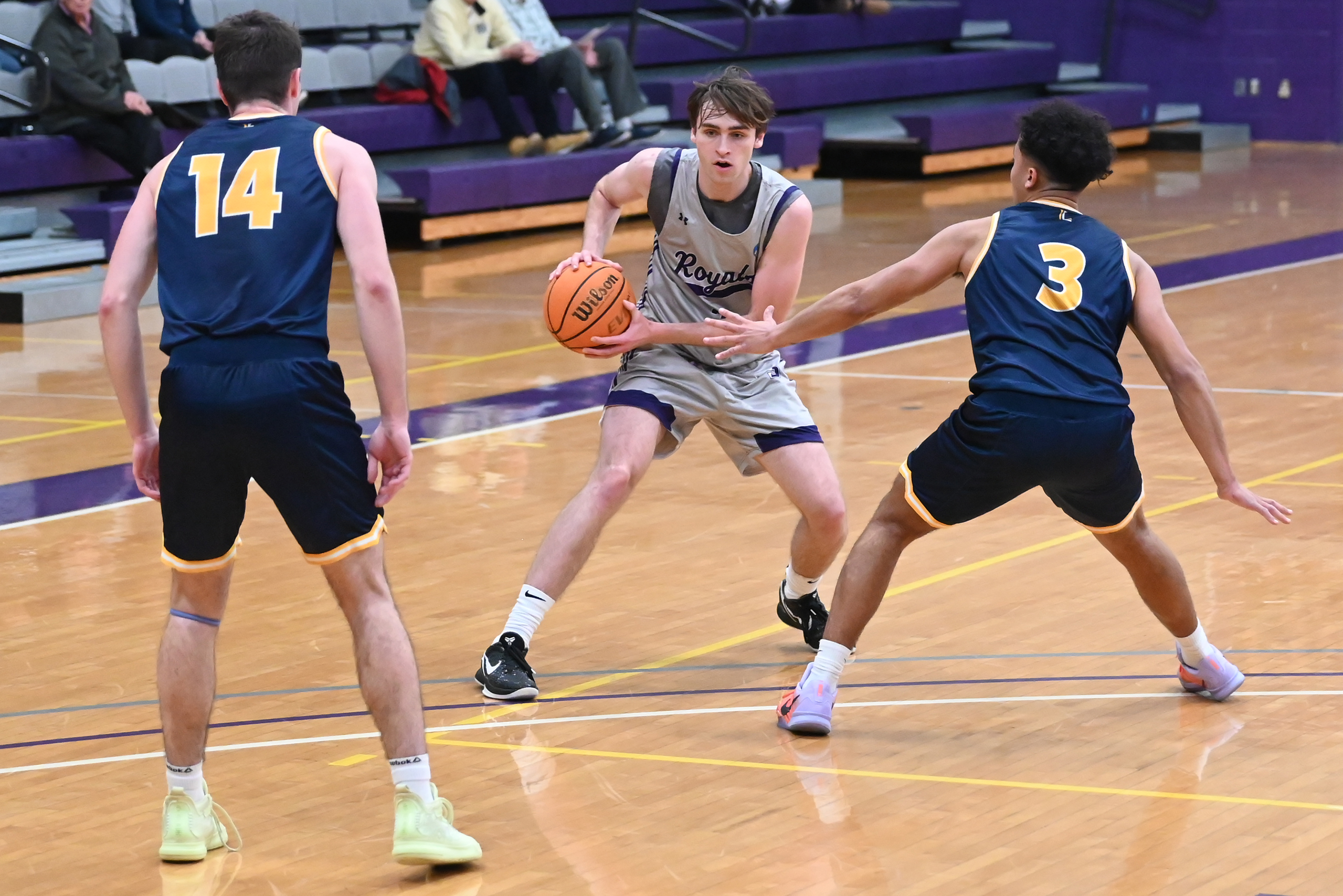 University of Scranton’s Sammy Tornabene is guarded by Lycoming’s Isaiah...
