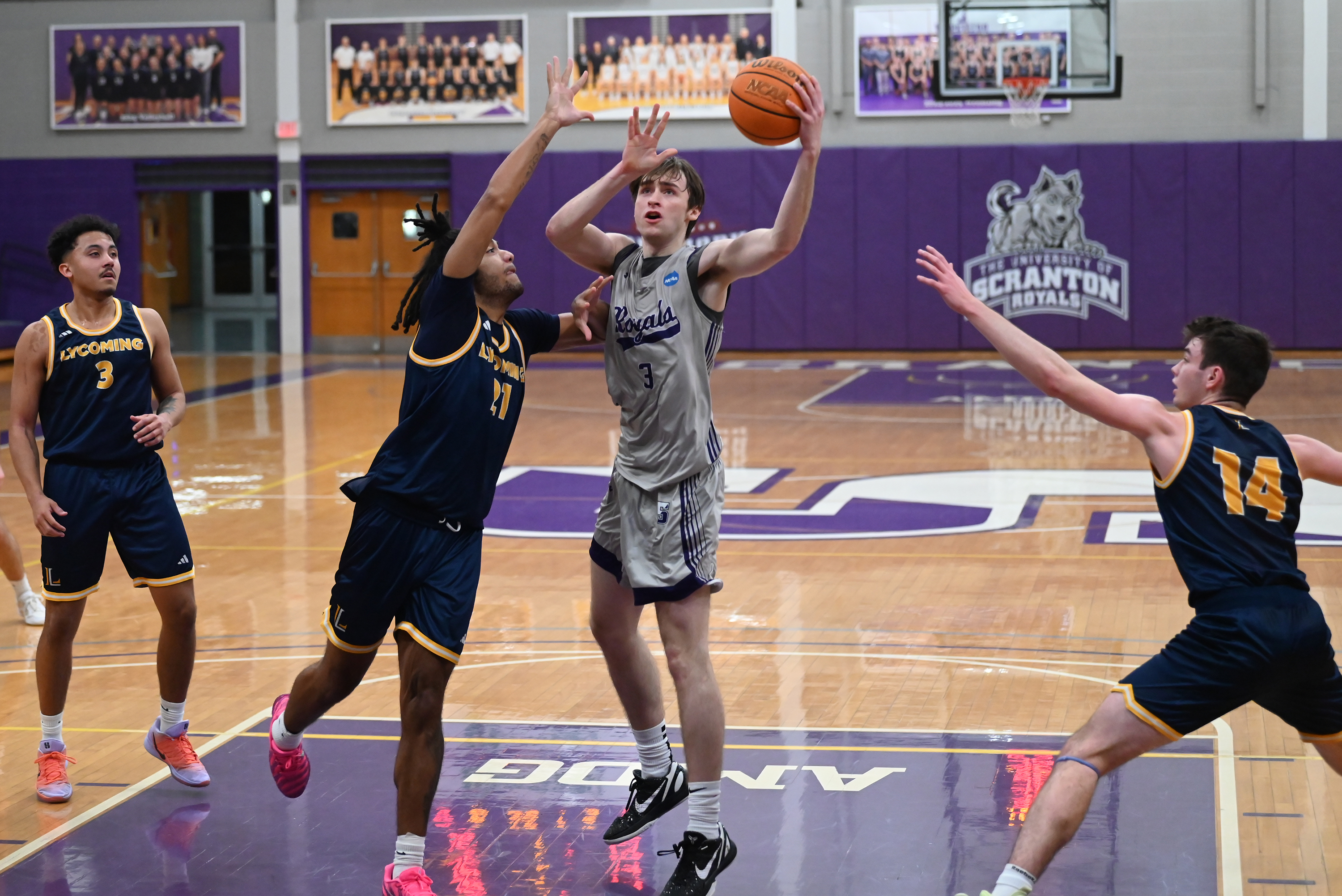 University of Scranton’s Sammy Tornabene shoots during the basketball game...