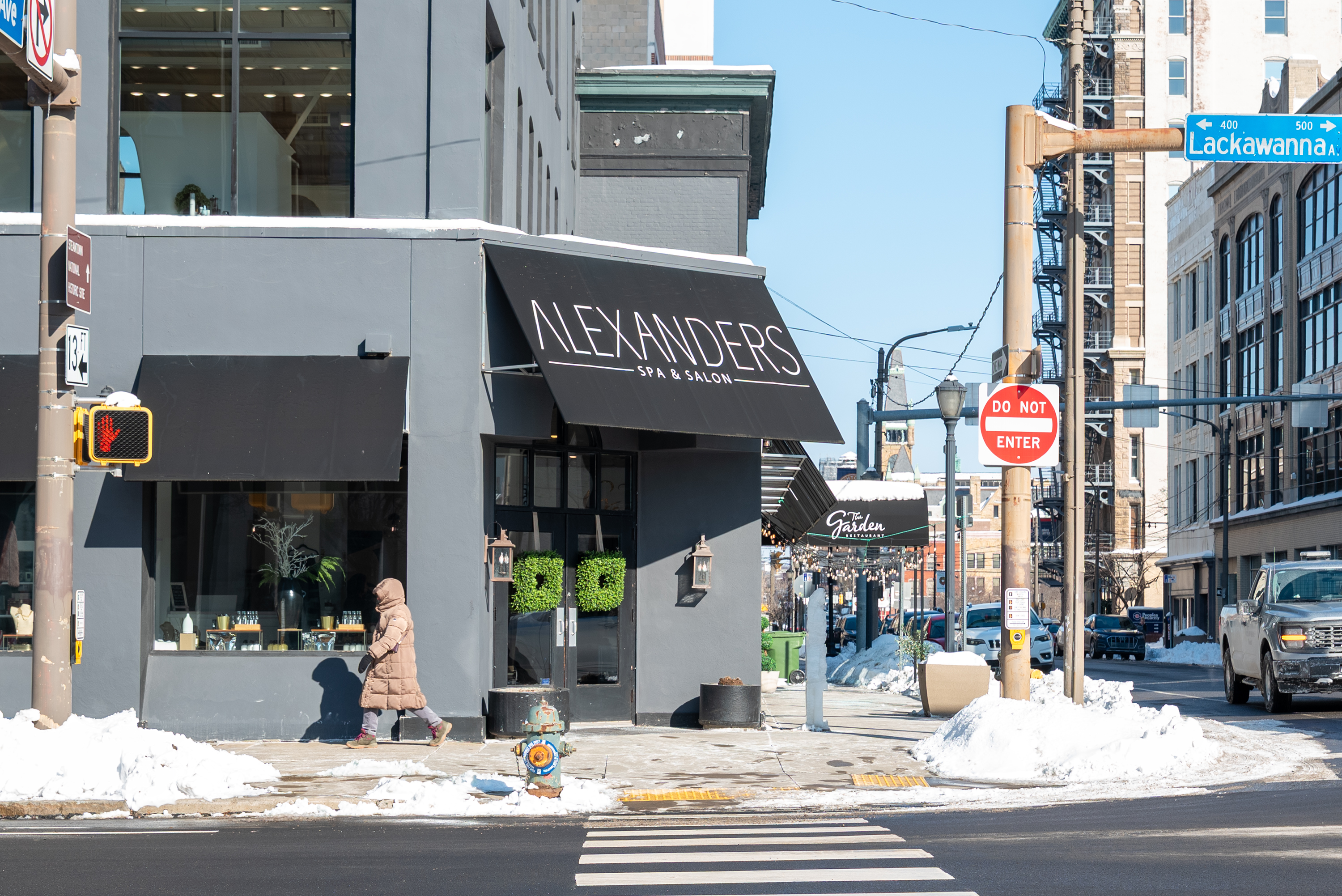 A pedestrian rounds the corner of Lackawanna Ave. and Washington...