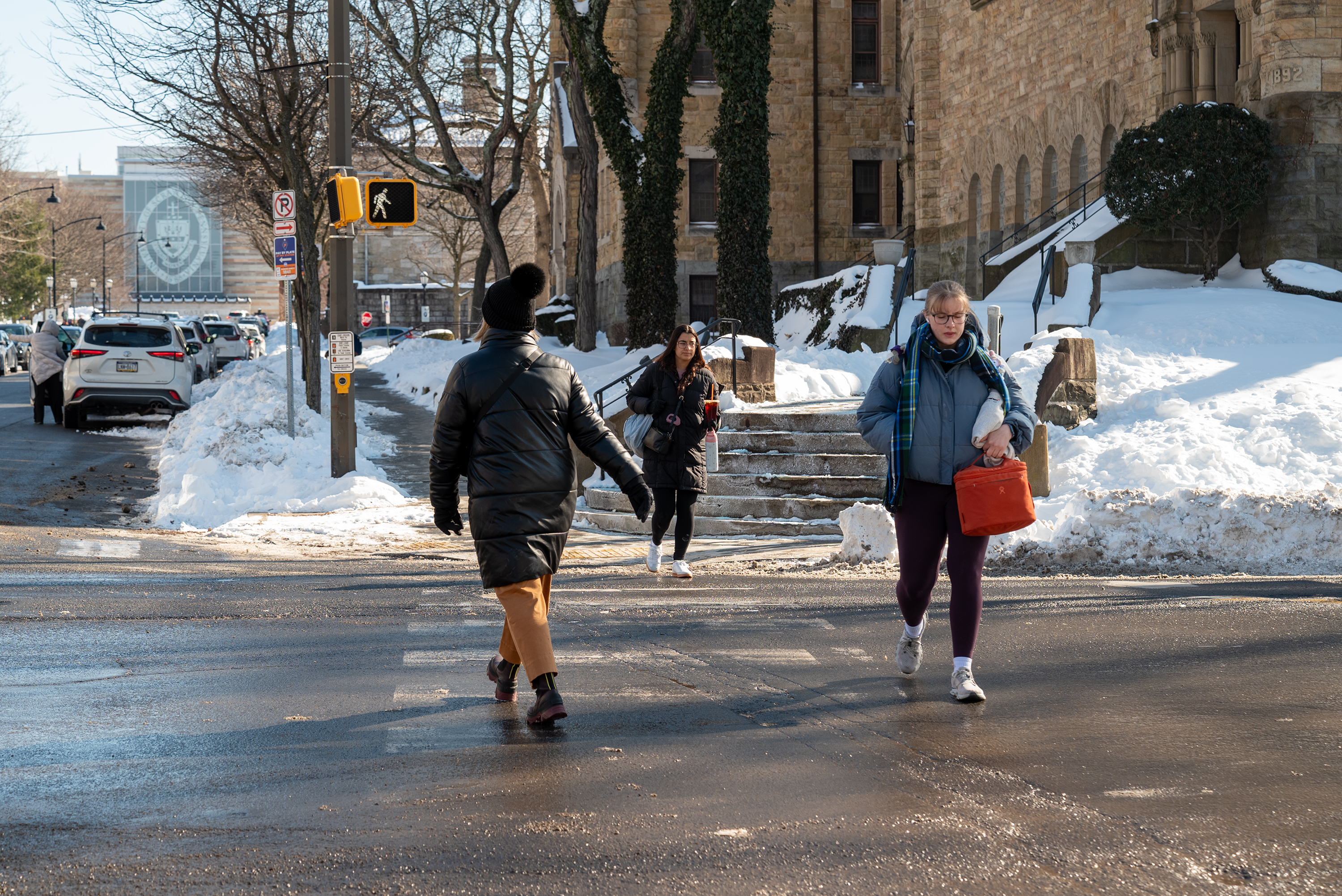 Pedestrians cross Jefferson Ave. and Linden St. on Thursday, Jan....